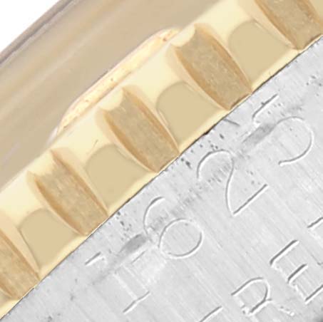 The image shows a close-up of the bezel and engraved edge of the Rolex Vintage Collection 1625 Men's Steel and Gold (two tone) Silver Dial 1625 Men's Steel and Gold (two tone) Silver Dial watch.