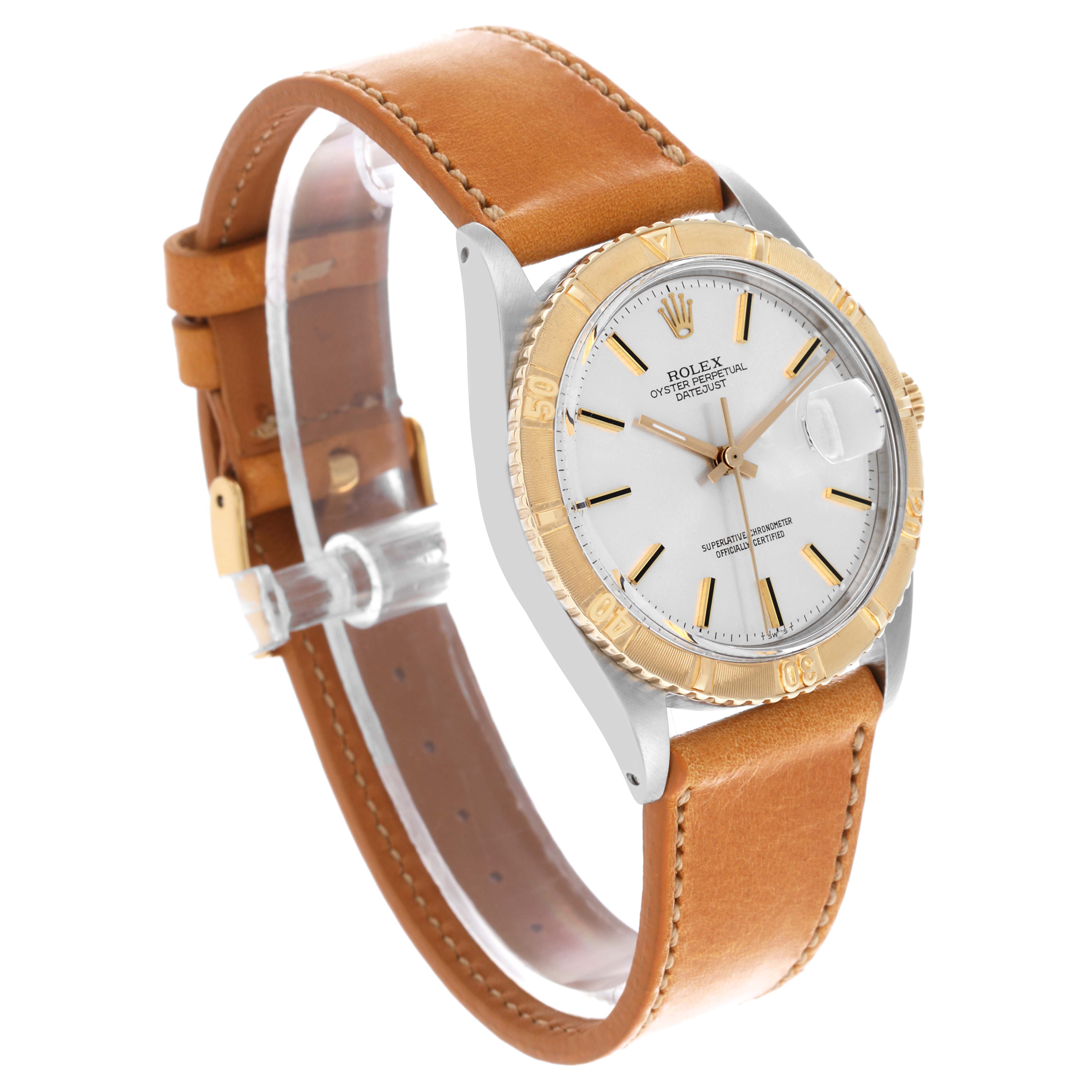 The Rolex Vintage Collection 1625 Men's Steel and Gold (two tone) Silver Dial 1625 Men's Steel and Gold (two tone) Silver Dial watch is shown at a three-quarter angle, featuring a gold bezel, white dial, and brown leather strap.