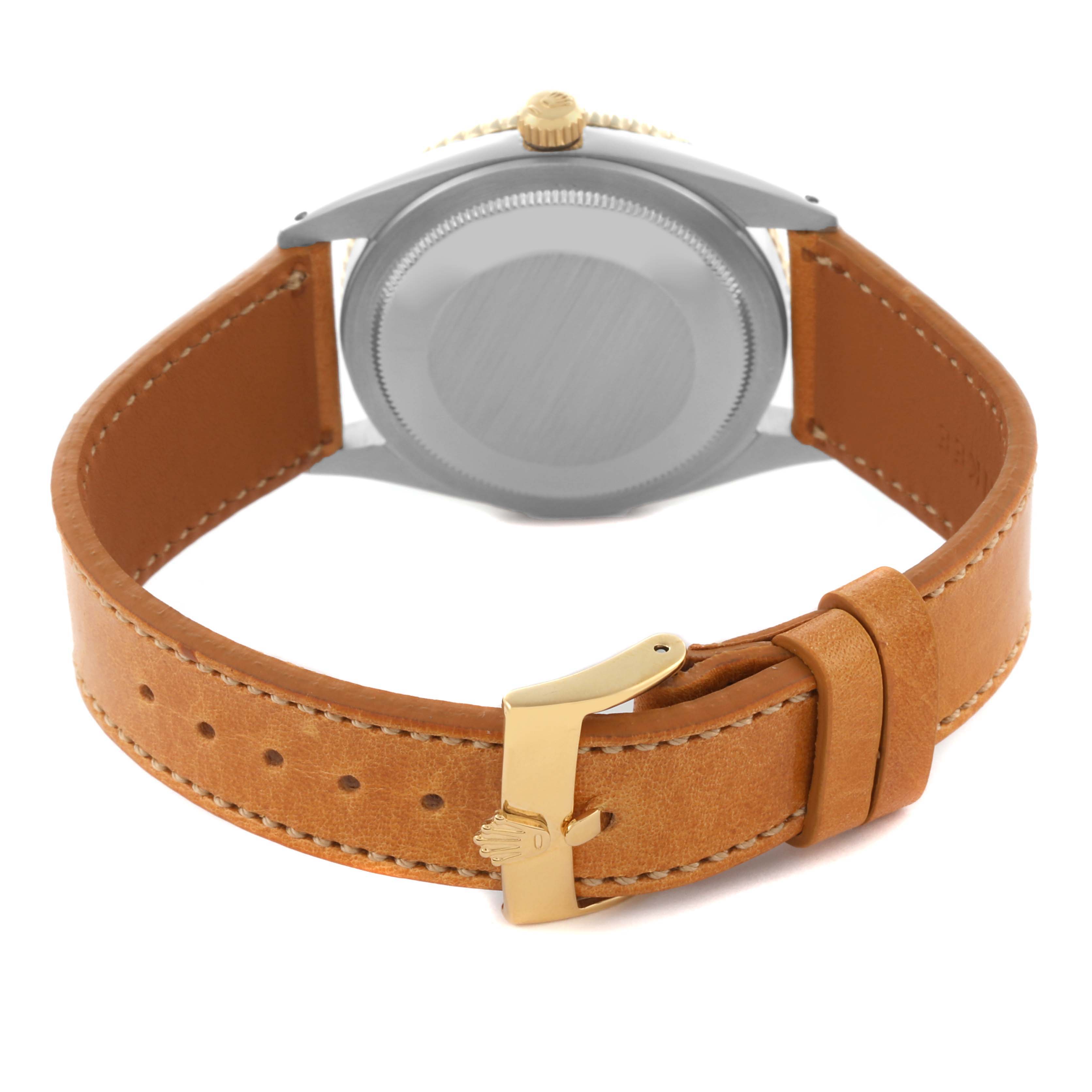 The image shows the back view of a Rolex Vintage Collection 1625 Men's Steel and Gold (two tone) Silver Dial 1625 Men's Steel and Gold (two tone) Silver Dial watch, highlighting the case back, crown, and brown leather strap with a buckle.