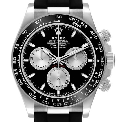 The Rolex Daytona 126519 Men's White Gold Black Dial watch is shown from a front angle, displaying the dial, bezel with tachymetric scale, pushers, and crown.