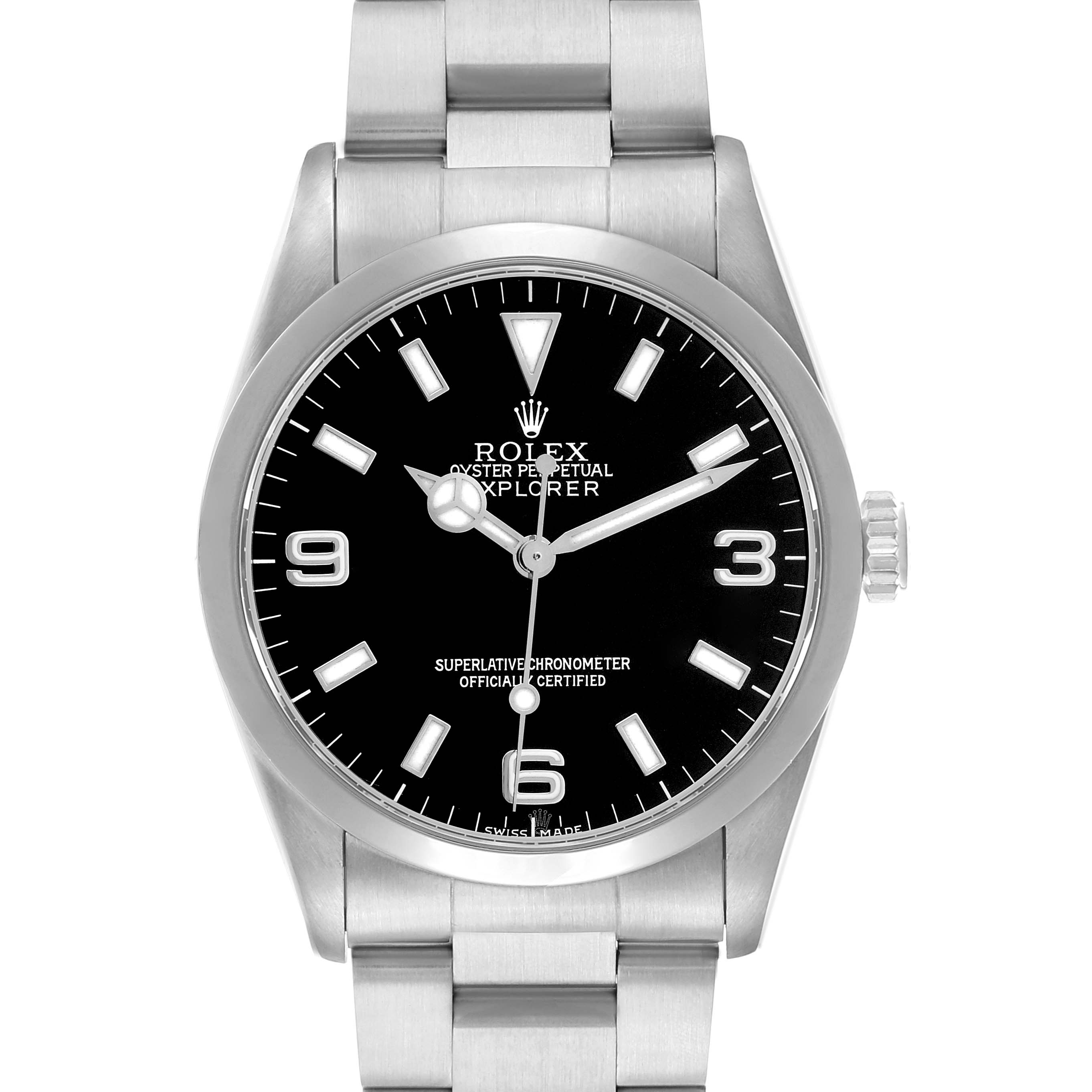 The image shows a front view of a Rolex Explorer 14270 Men's Stainless Steel Black Dial watch, displaying its dial, bezel, crown, and part of the bracelet.