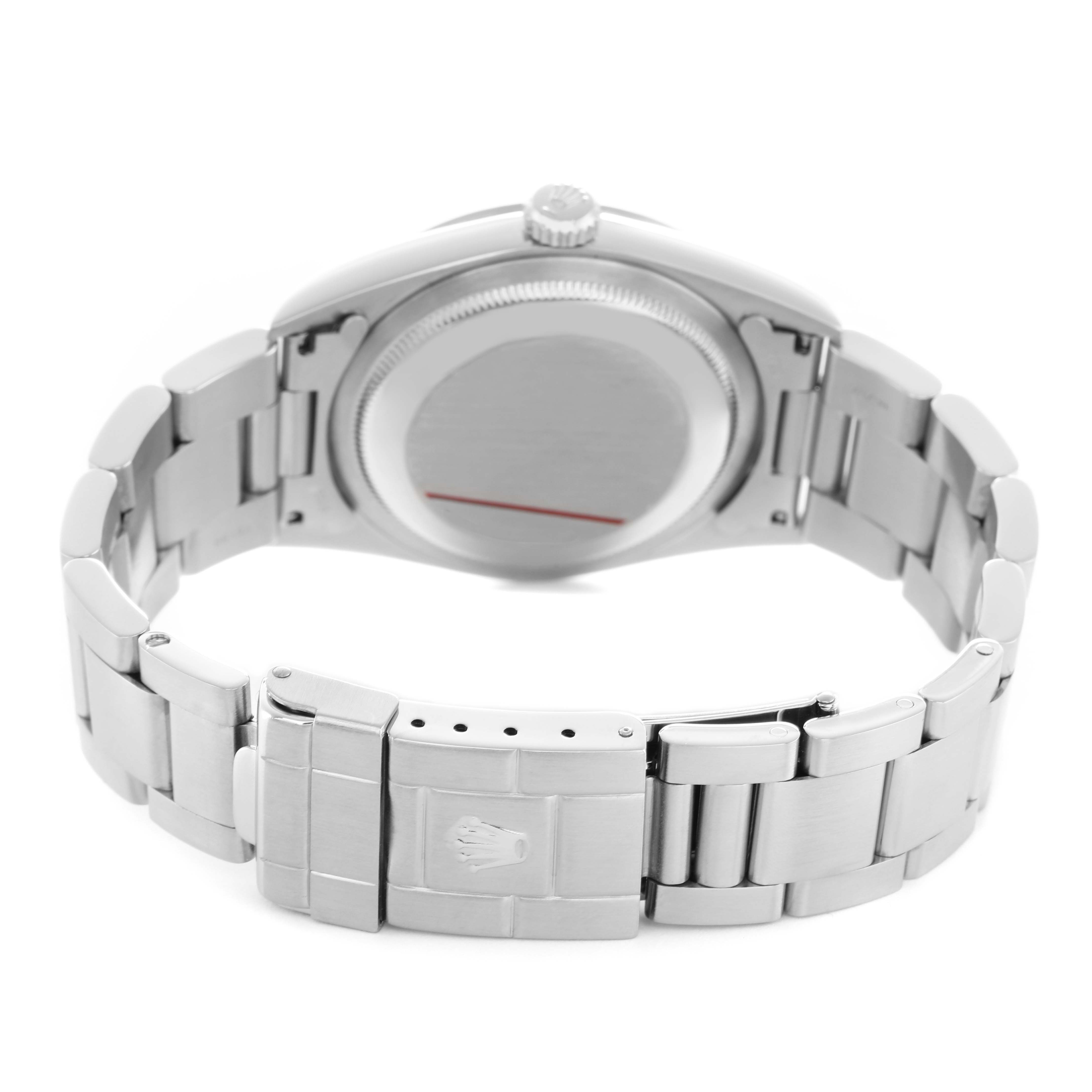 The Rolex Explorer 14270 Men's Stainless Steel Black Dial watch is shown from the back, displaying the case back, crown, and bracelet with clasp.