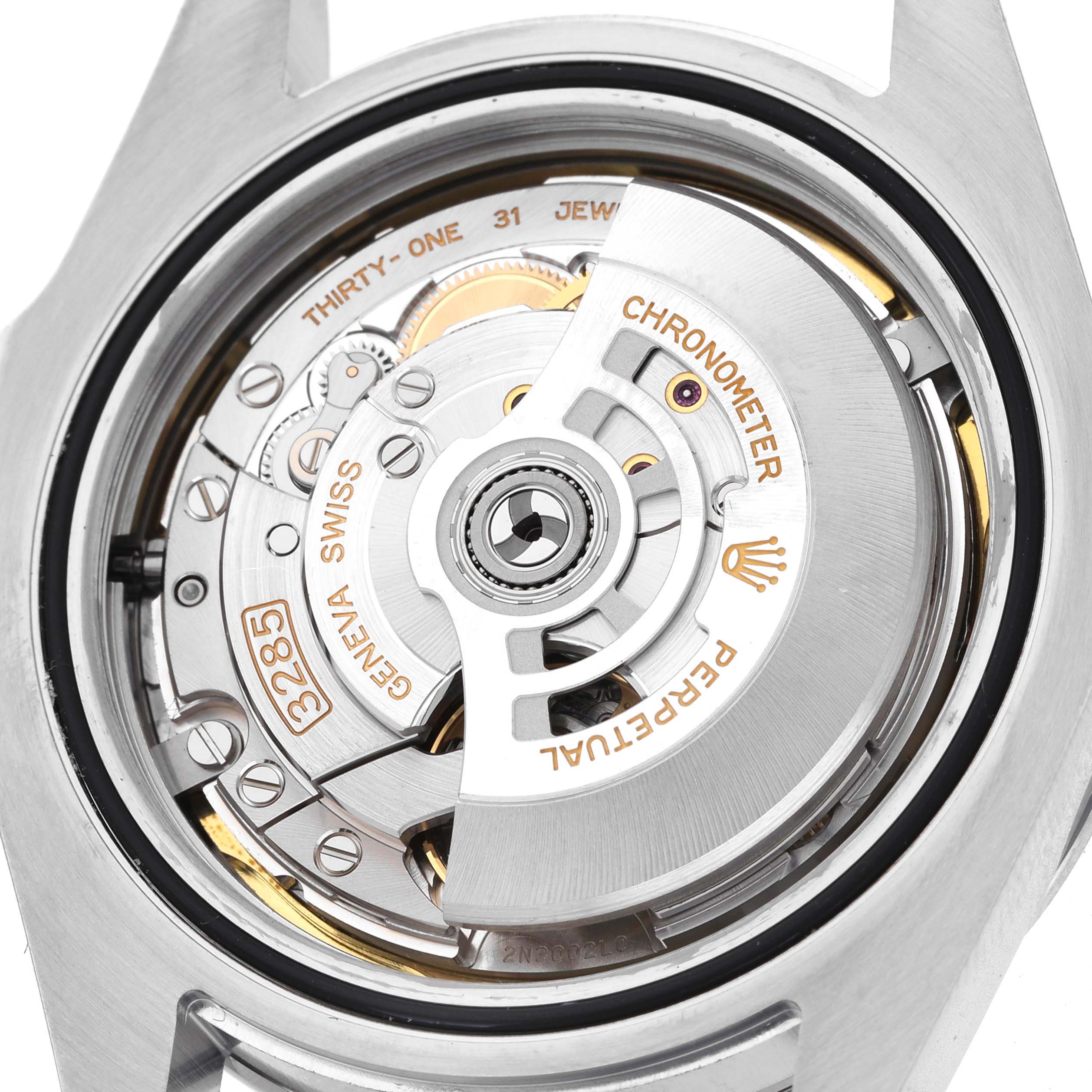 The image shows the back case of a Rolex Explorer 226570 Men's Stainless Steel Black Dial, highlighting the movement and internal mechanics.