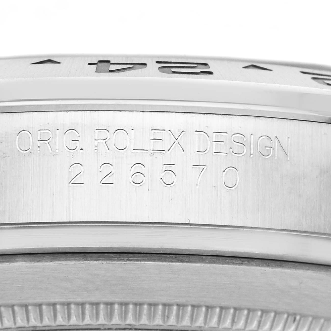 The image shows a close-up of the Rolex Explorer 226570 Men's Stainless Steel Black Dial's side, featuring the "ORIG. ROLEX DESIGN" engraving and model number 226570.