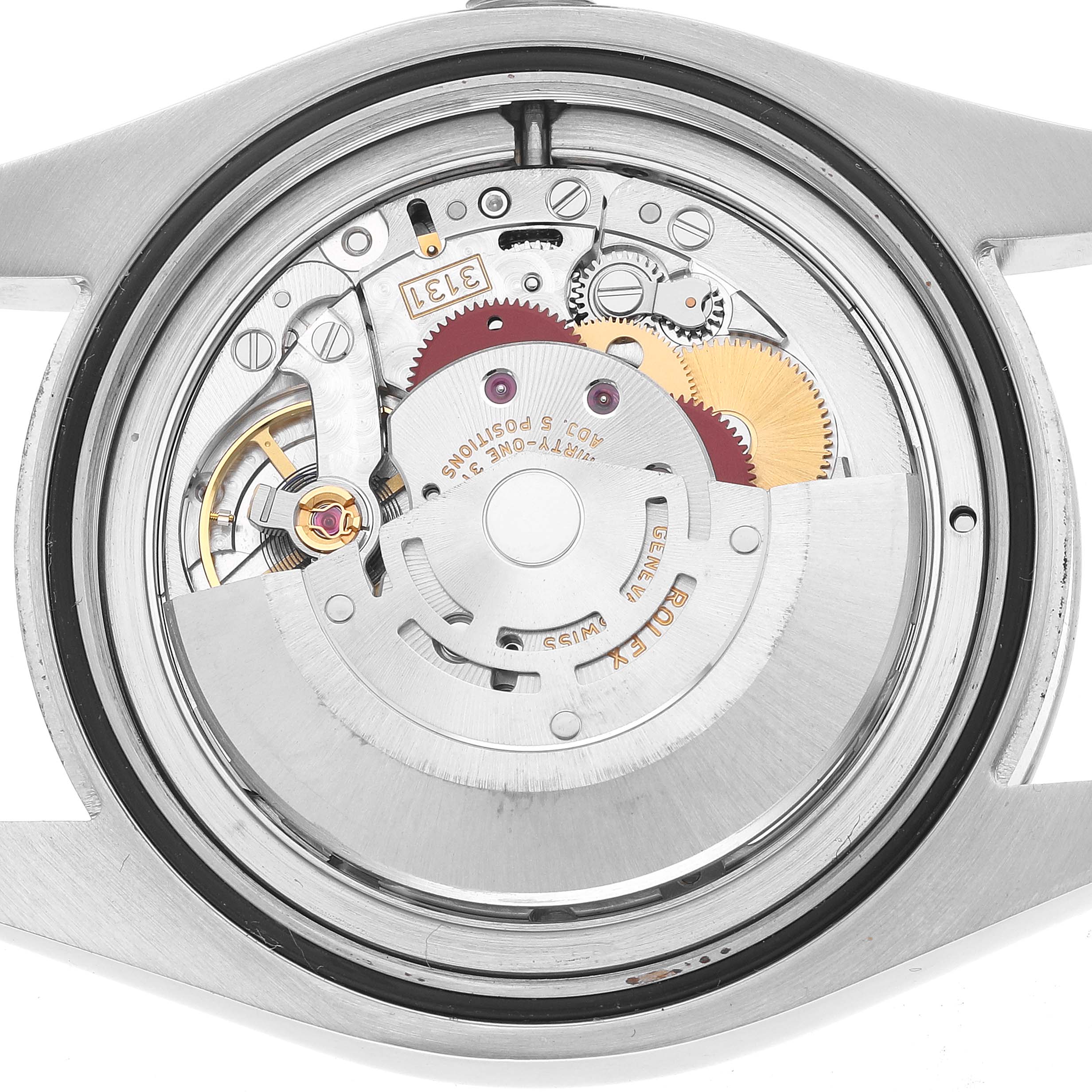 The image shows the movement of a Rolex Milgauss 116400GV Men's Stainless Steel Black Dial watch from a rear angle, highlighting the intricate gears and mechanics.