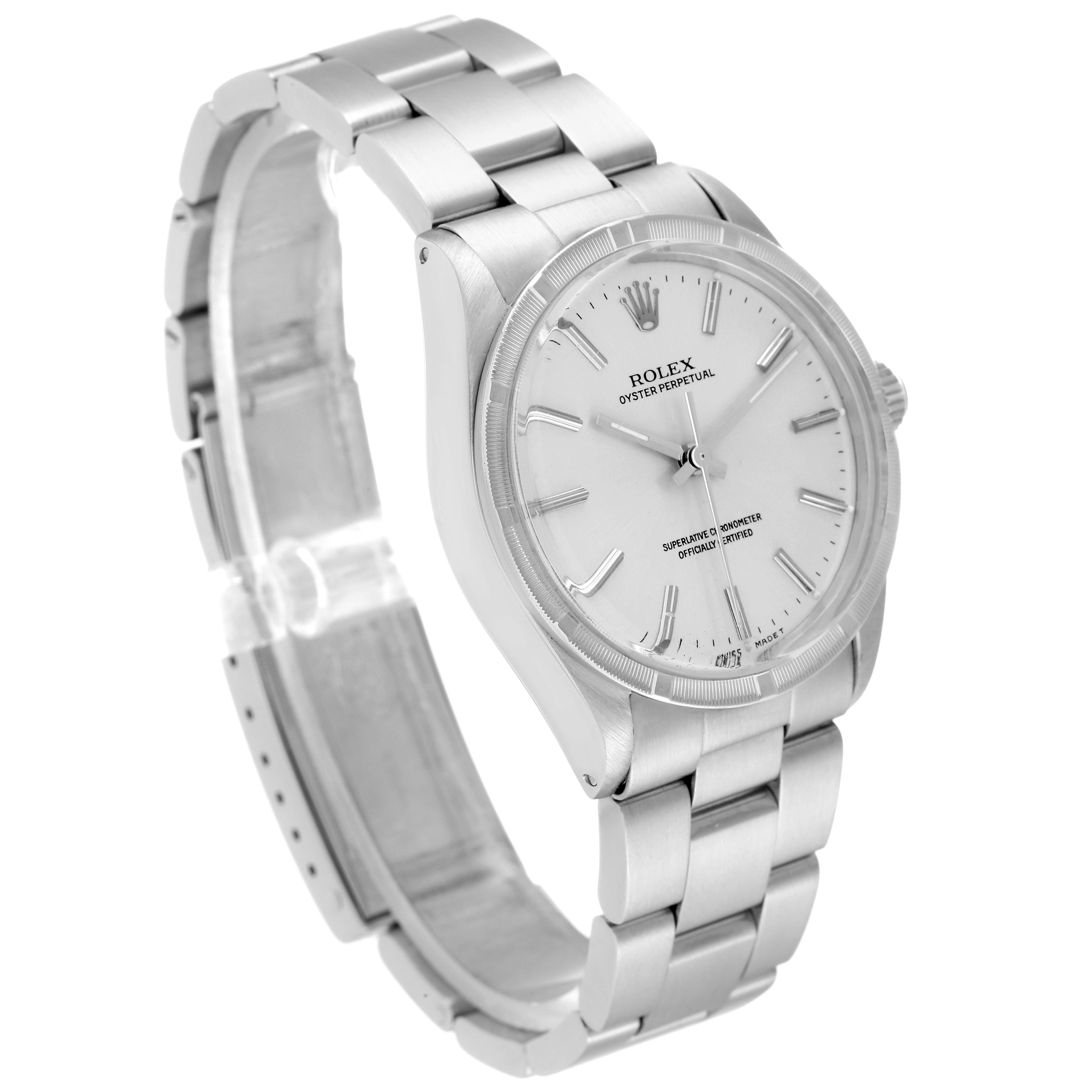 This is a side angle view of the Rolex Vintage Collection 1007 Men's Stainless Steel Silver Dial 1007 Men's Stainless Steel Silver Dial watch, featuring its face, bezel, and metal bracelet.