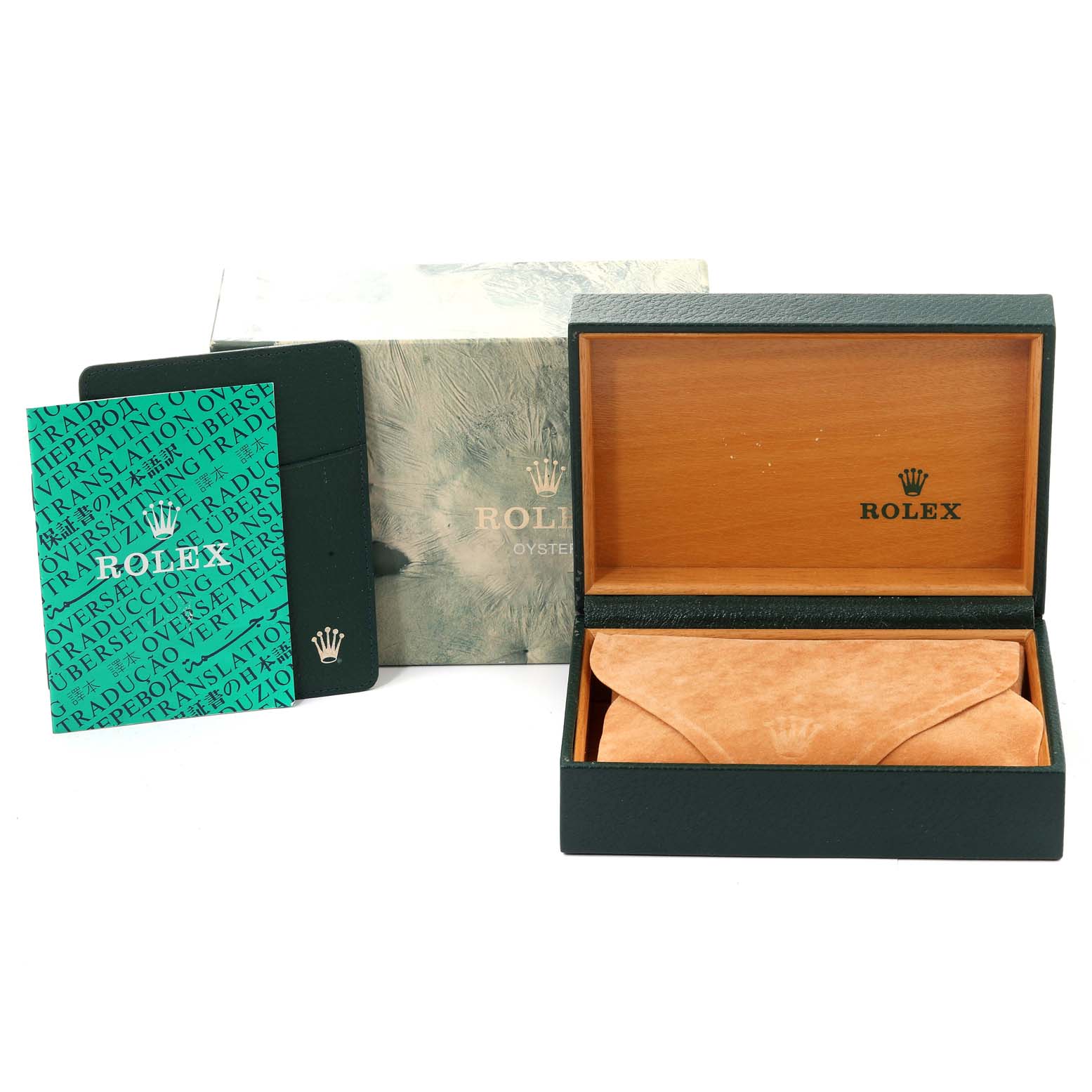 The image shows the open box and packaging accessories for the Vintage Collection model by Rolex.
