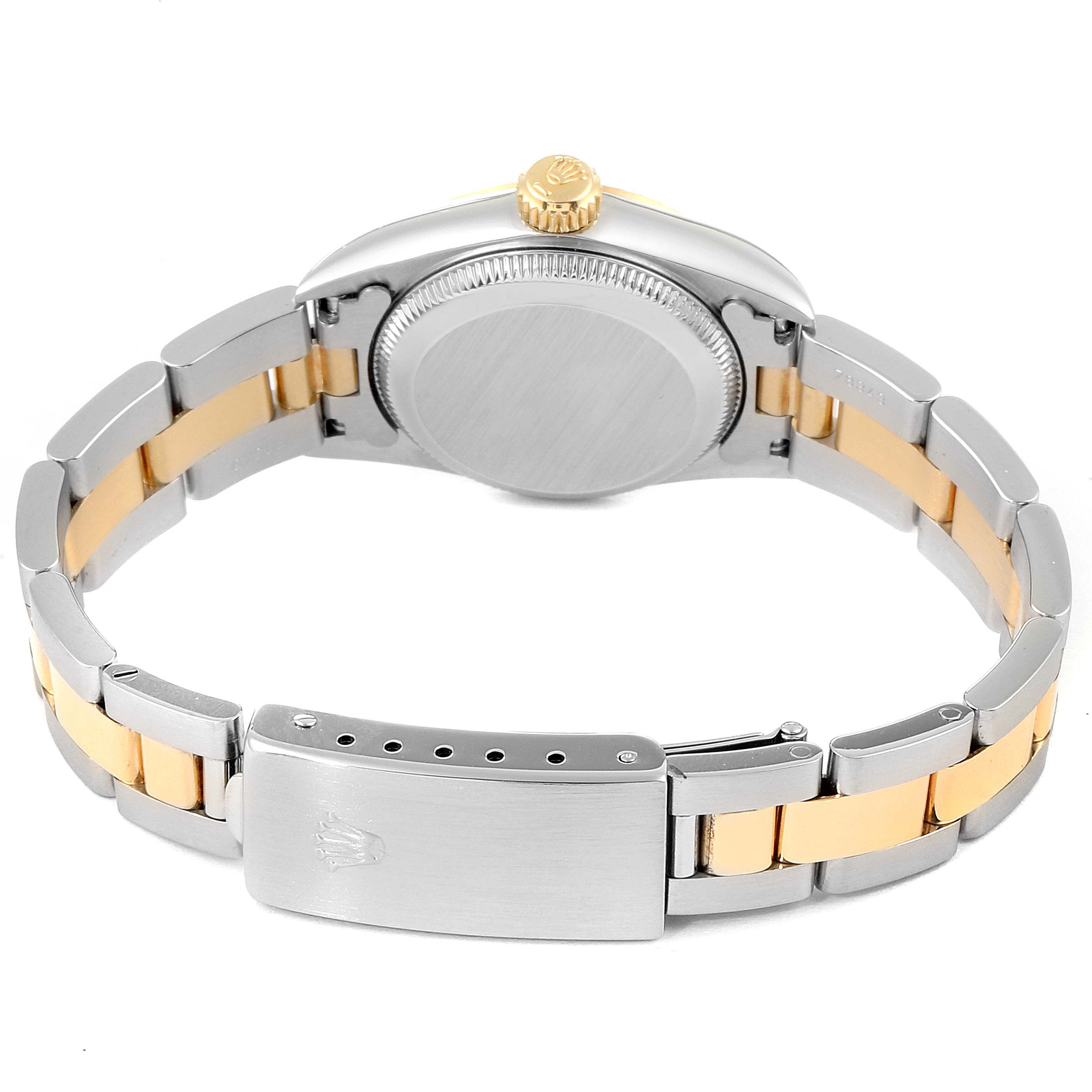 The image shows the back of a Rolex Oyster Perpetual 67193 Women's Steel and Gold (two tone) Champagne Dial 67193 Women's Steel and Gold (two tone) Champagne Dial watch, highlighting the case, crown, and two-tone bracelet with the clasp.