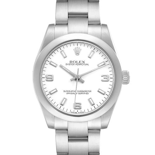 The Rolex Oyster Perpetual 177200 Women's Stainless Steel White Dial watch is shown from a frontal view, displaying the dial, bezel, and part of the bracelet.