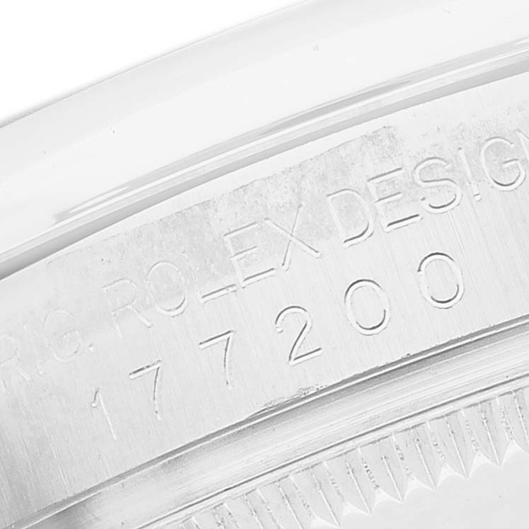 The image shows a close-up of the engraved case edge of a Rolex Oyster Perpetual 177200 Women's Stainless Steel White Dial, displaying the model number.