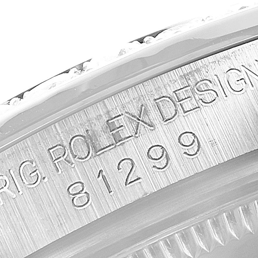 The image shows an angled close-up of the model number and "ROLEX DESIGN" engraving on a Rolex Pearlmaster 81285 Women's White Gold Mother of Pearl Dial 81285 Women's White Gold Mother of Pearl Dial watch.