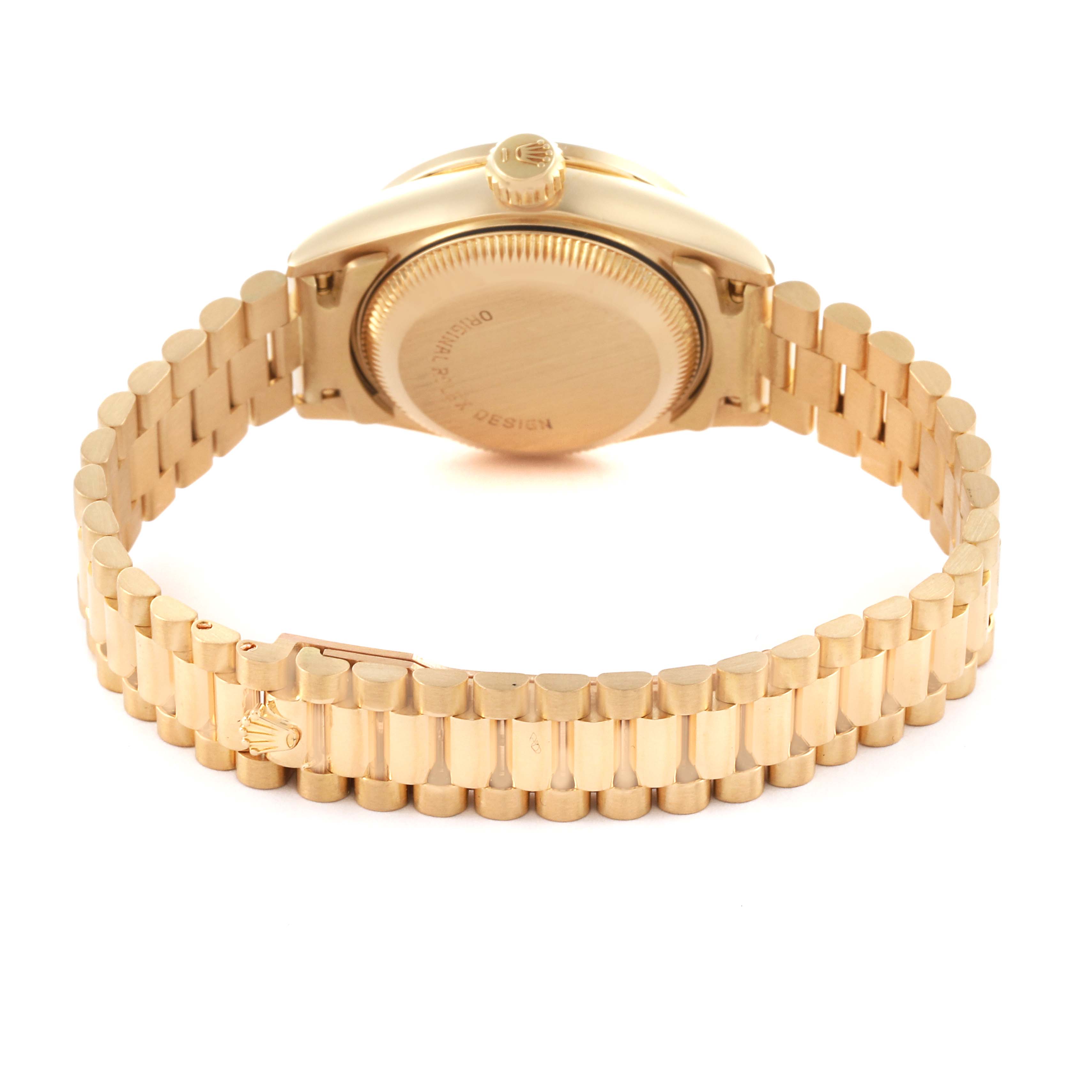 The image shows the back and bracelet of the Rolex President 69138 Women's Yellow Gold Champagne Dial 69138 Women's Yellow Gold Champagne Dial model watch at a slightly elevated angle.