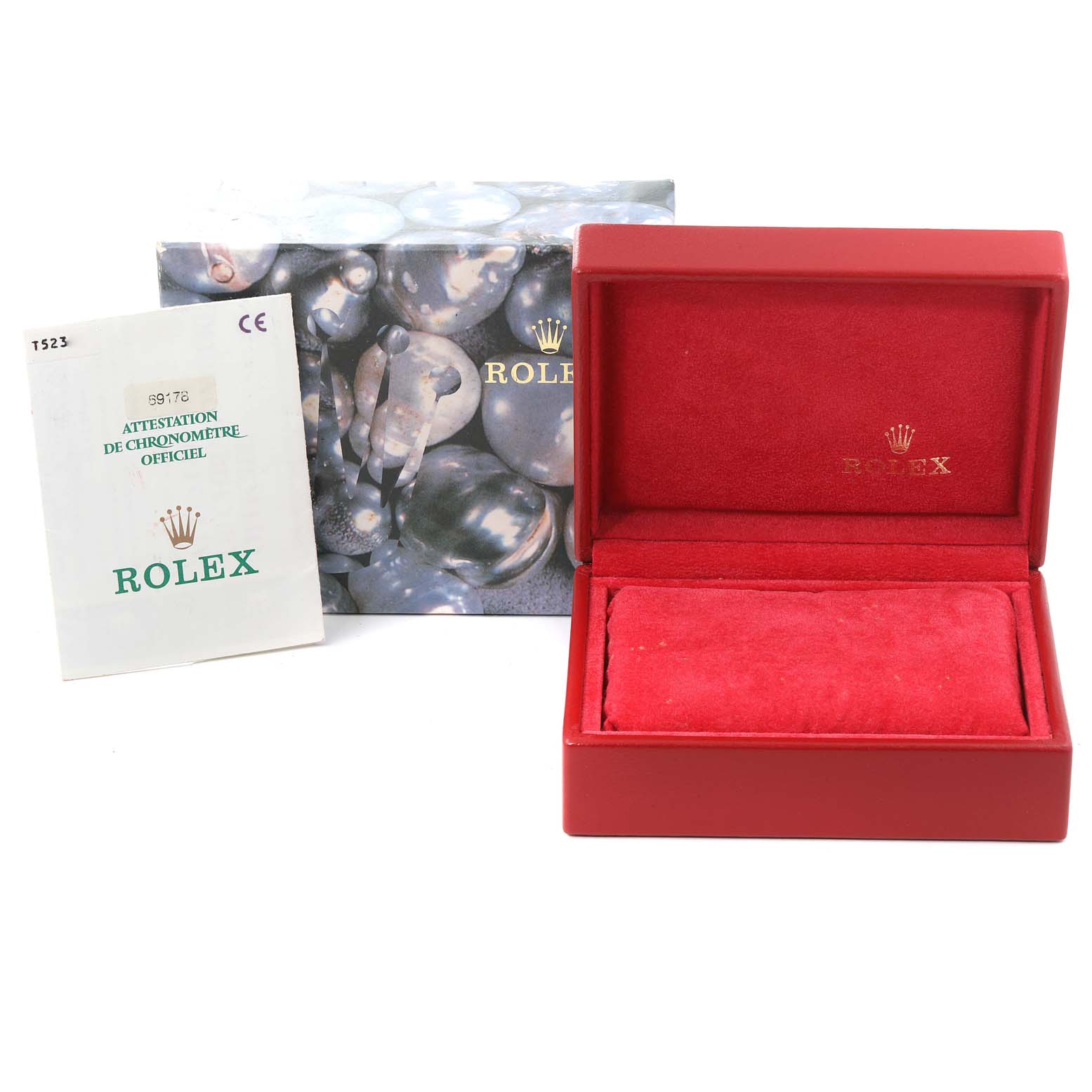 The image shows an empty, open red box and official documentation for a Rolex President 69178 Women
s Yellow Gold Champagne Dial 69178 Women
s Yellow Gold Champagne Dial model watch.