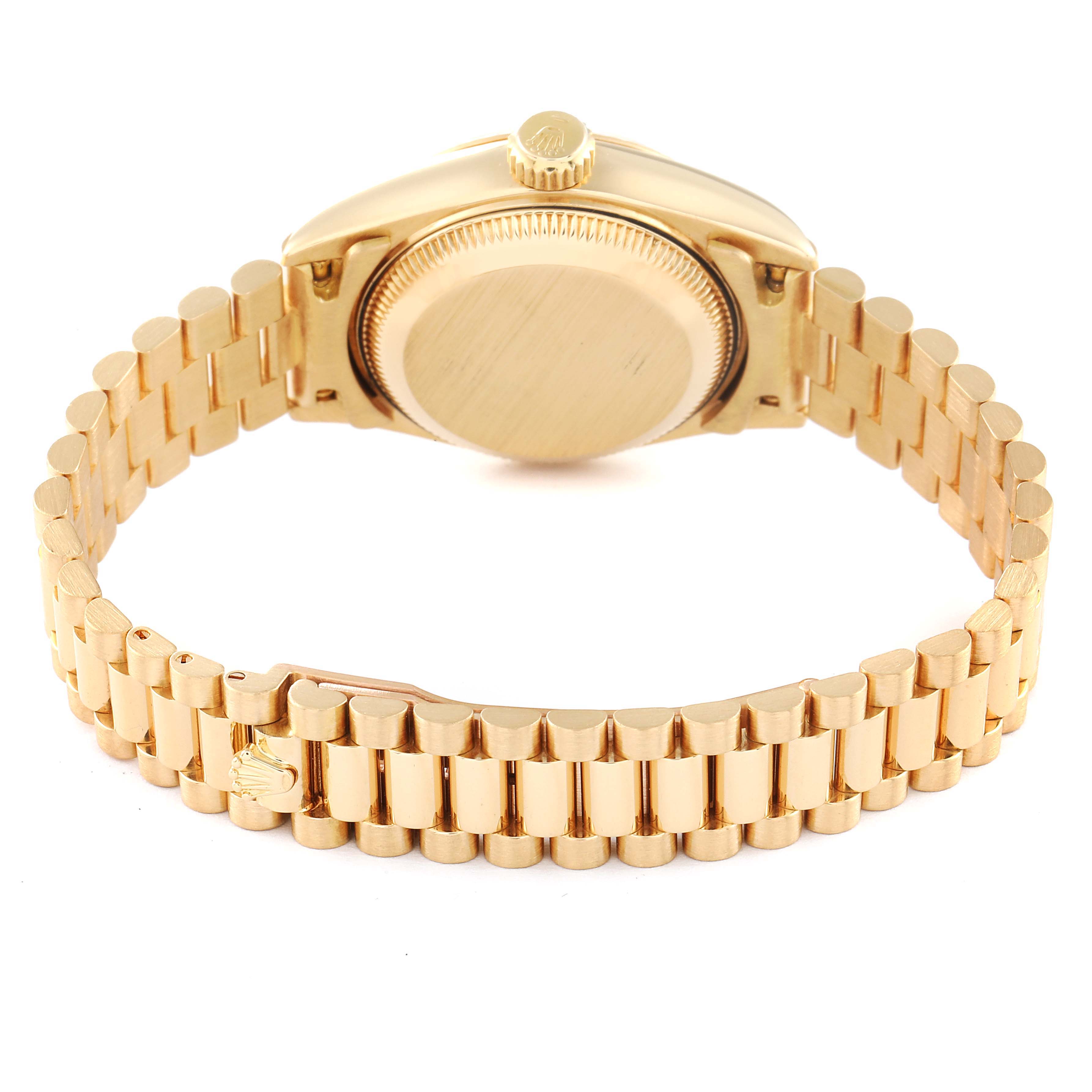 This image shows the back side of a Rolex President 69178 Women
s Yellow Gold Champagne Dial 69178 Women
s Yellow Gold Champagne Dial model watch, focusing on the case back, crown, and bracelet.