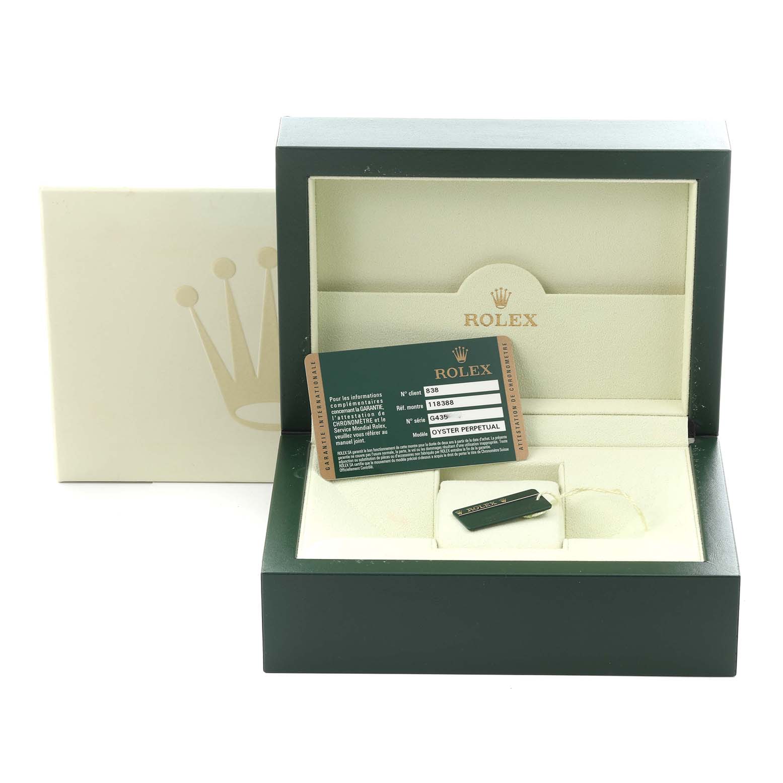 The image shows the packaging and accessories for the Rolex President 118388 Men's Yellow Gold Champagne Dial 118388 Men's Yellow Gold Champagne Dial model, including a box, warranty card, and tag.