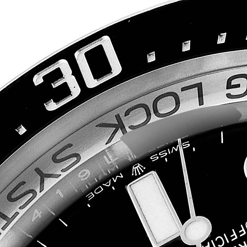 The close-up image shows part of the bezel and dial of the Rolex Sea-Dweller 126660 Men's Stainless Steel Blue Dial 126660 Men's Stainless Steel Blue Dial watch, specifically the 30-minute mark.