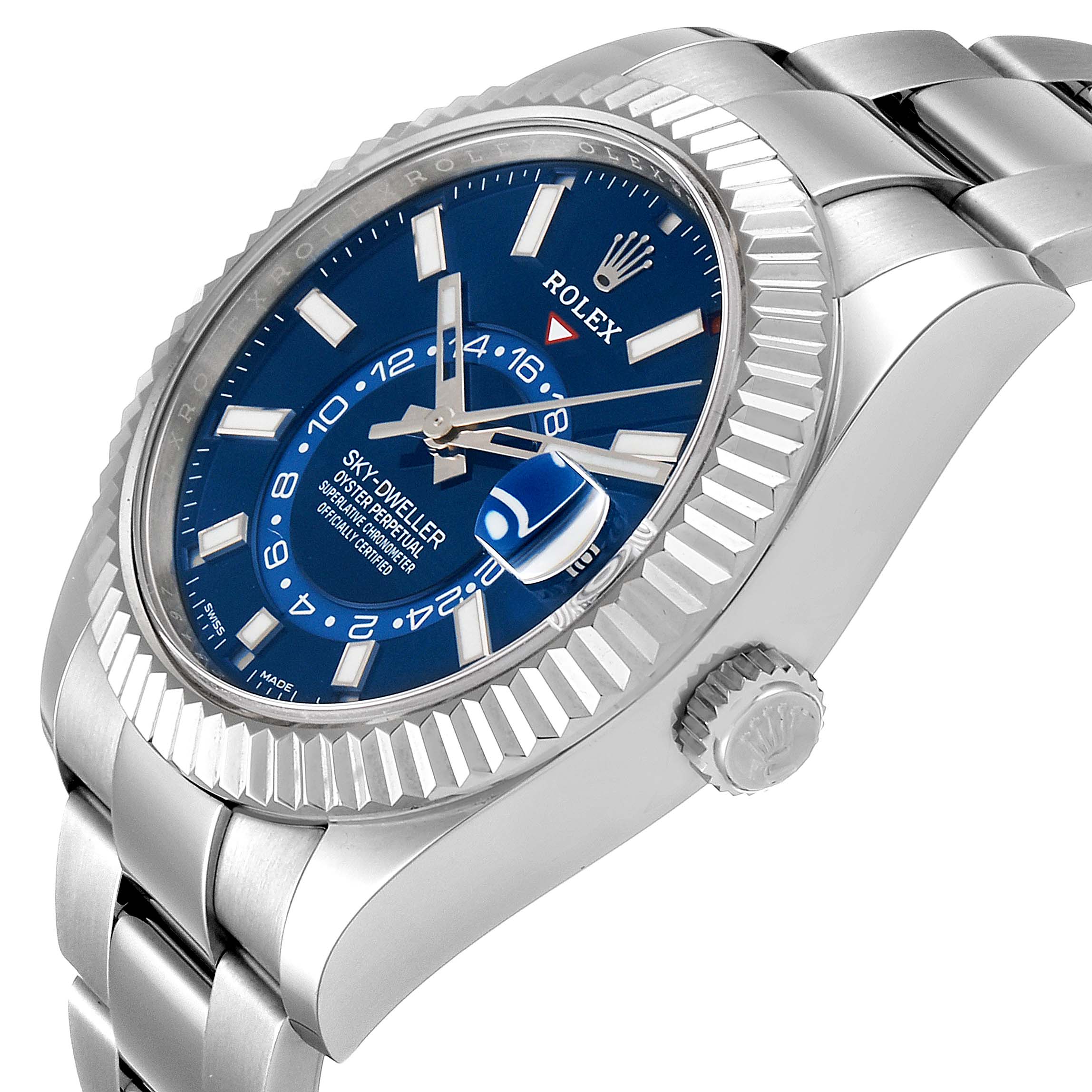 This image shows a side angle of a Rolex Sky-Dweller 326934 Men's Stainless Steel Blue Dial 326934 Men's Stainless Steel Blue Dial watch, highlighting the fluted bezel, blue dial, and partial bracelet.