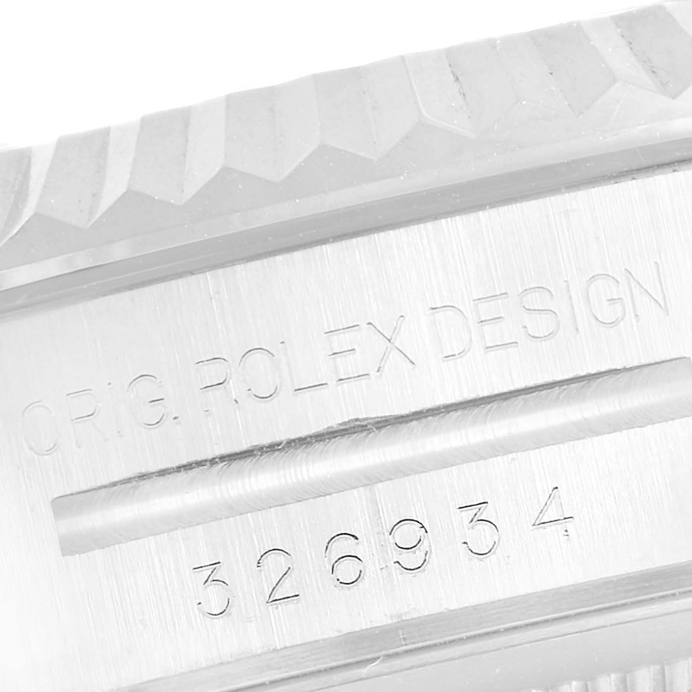 Close-up view showing the engraved bezel and serial number of the Rolex Sky-Dweller 326934 Men's Stainless Steel Blue Dial 326934 Men's Stainless Steel Blue Dial watch.