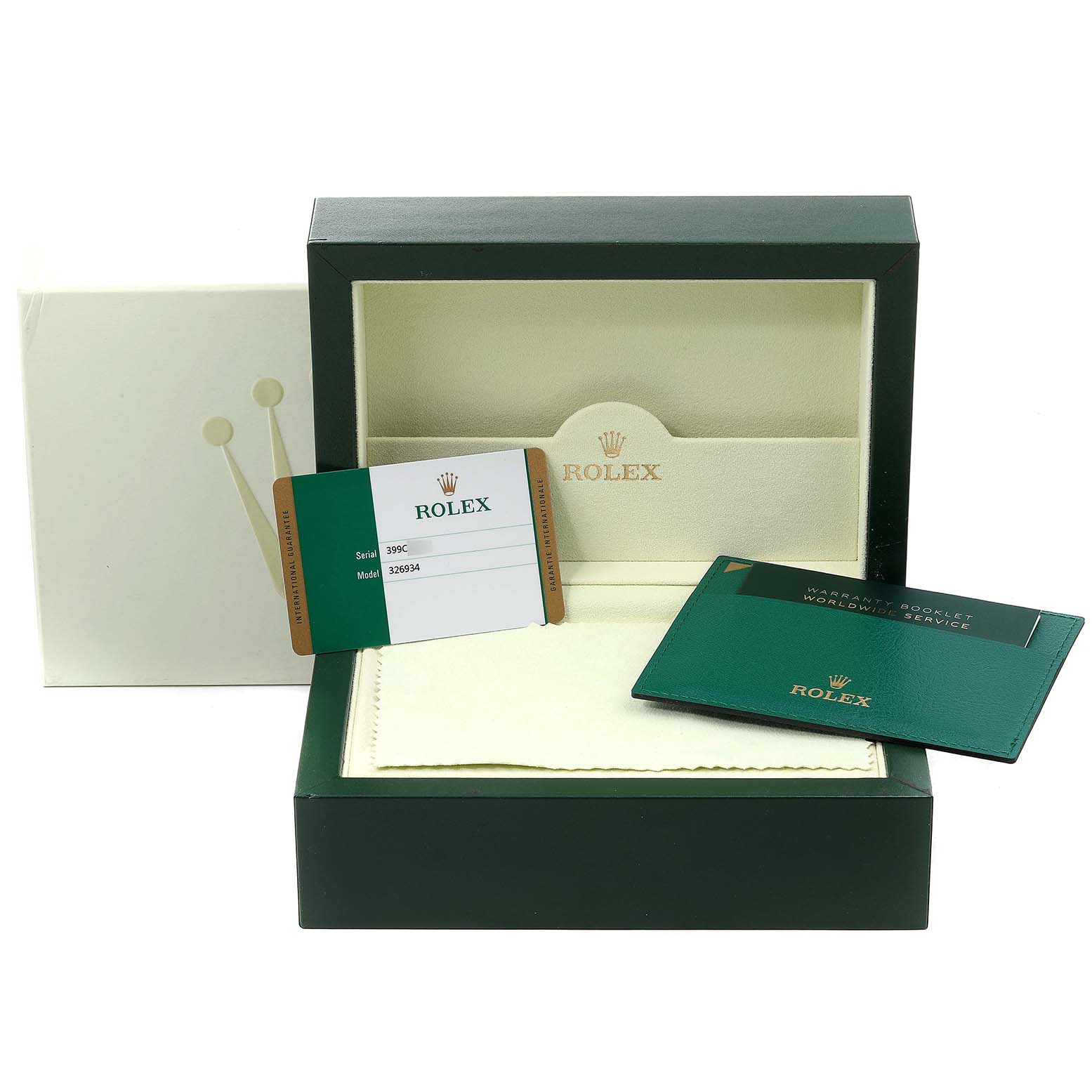 This image shows the box, warranty card, and booklet for the Rolex Sky-Dweller 326934 Men's Stainless Steel Blue Dial 326934 Men's Stainless Steel Blue Dial model.