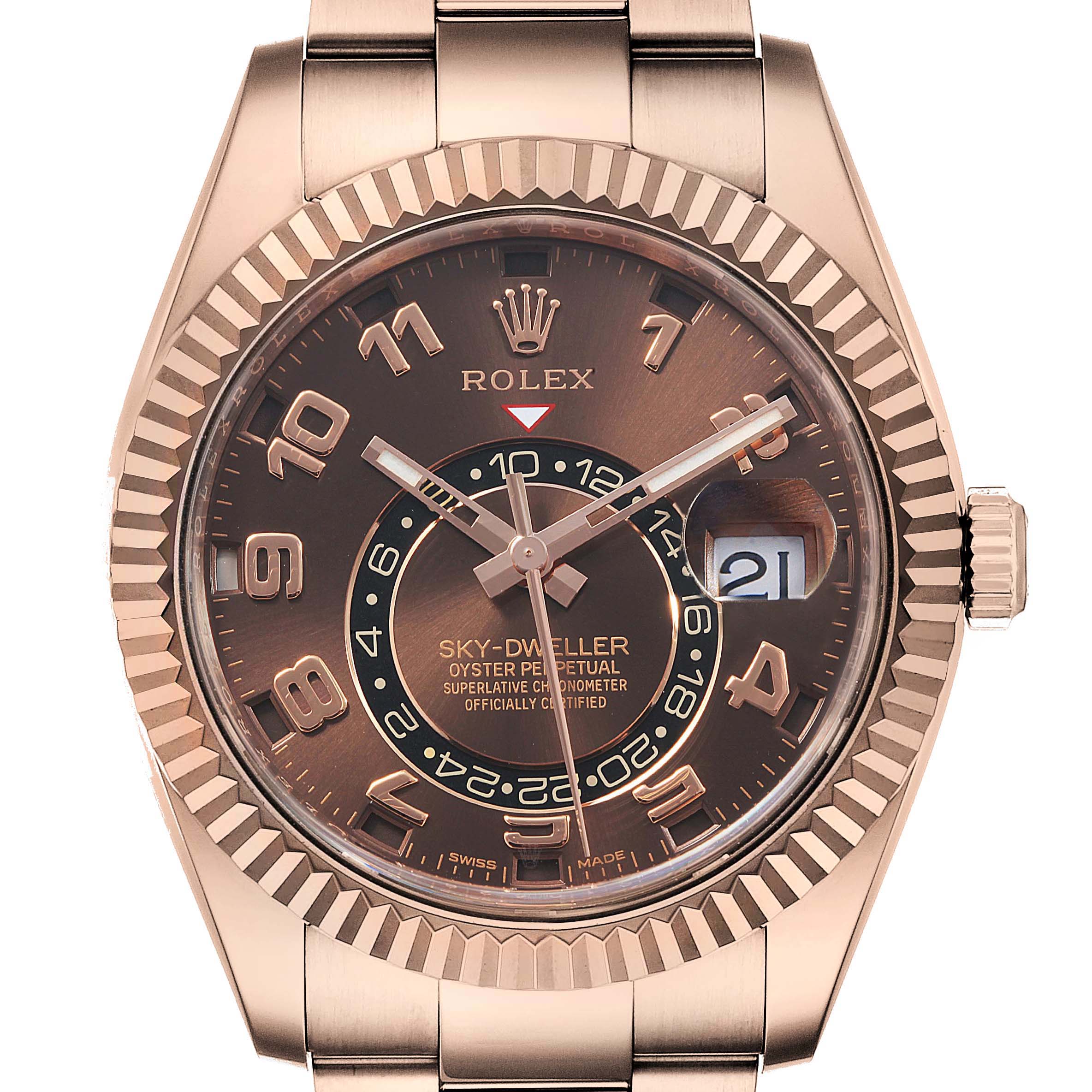 The image shows a front angle of the Rolex Sky-Dweller 326935 Men's Rose Gold Brown Dial 326935 Men's Rose Gold Brown Dial watch, highlighting its brown dial, bezel, hour markers, and date display.