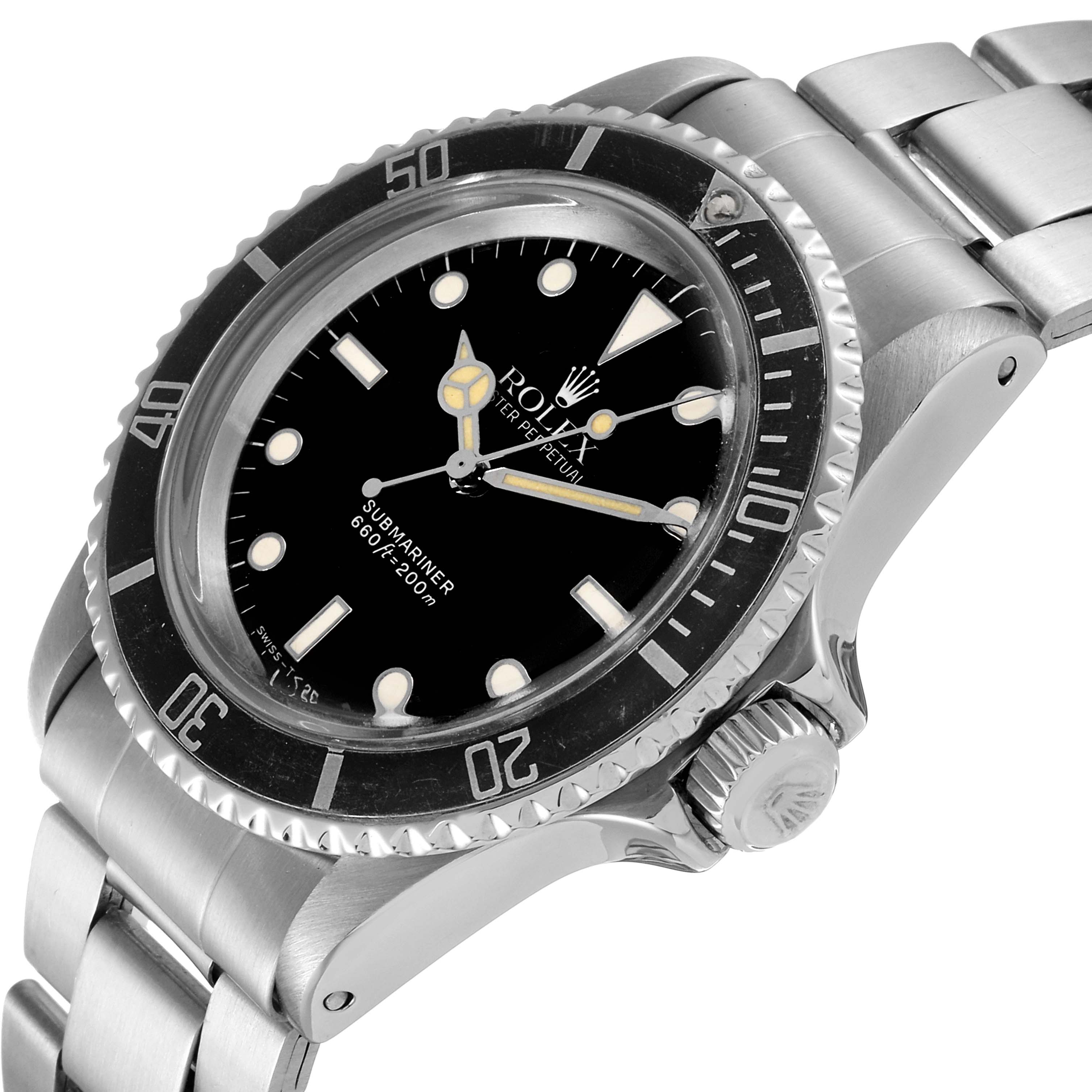 The Rolex Vintage Collection 5513 Men
s Stainless Steel Black Dial 5513 Men
s Stainless Steel Black Dial Submariner watch is shown at an angle emphasizing the dial, bezel, crown, and part of the bracelet.