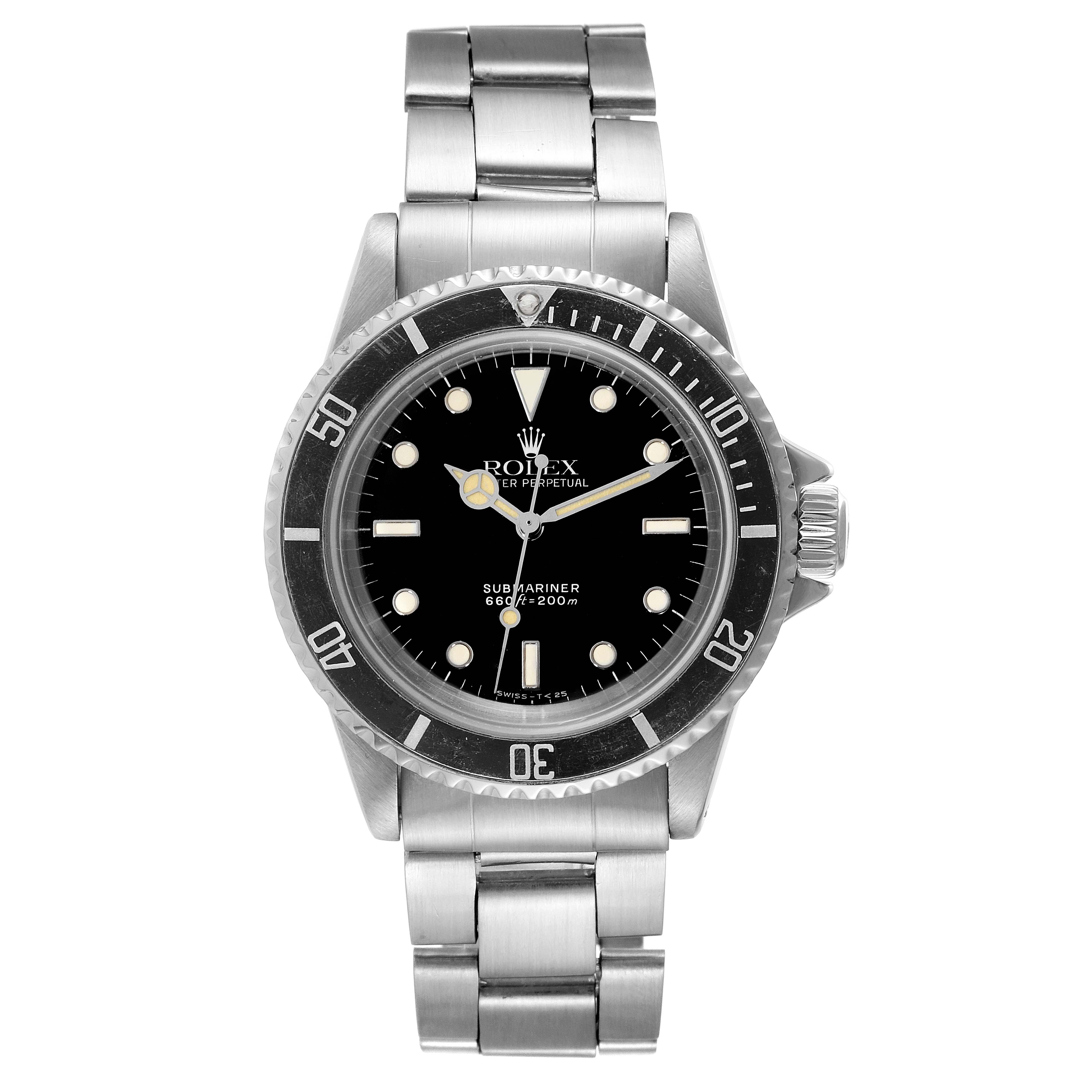The image shows a front view of a Rolex Vintage Collection 5513 Men
s Stainless Steel Black Dial 5513 Men
s Stainless Steel Black Dial Submariner watch, highlighting the dial, bezel, and bracelet.