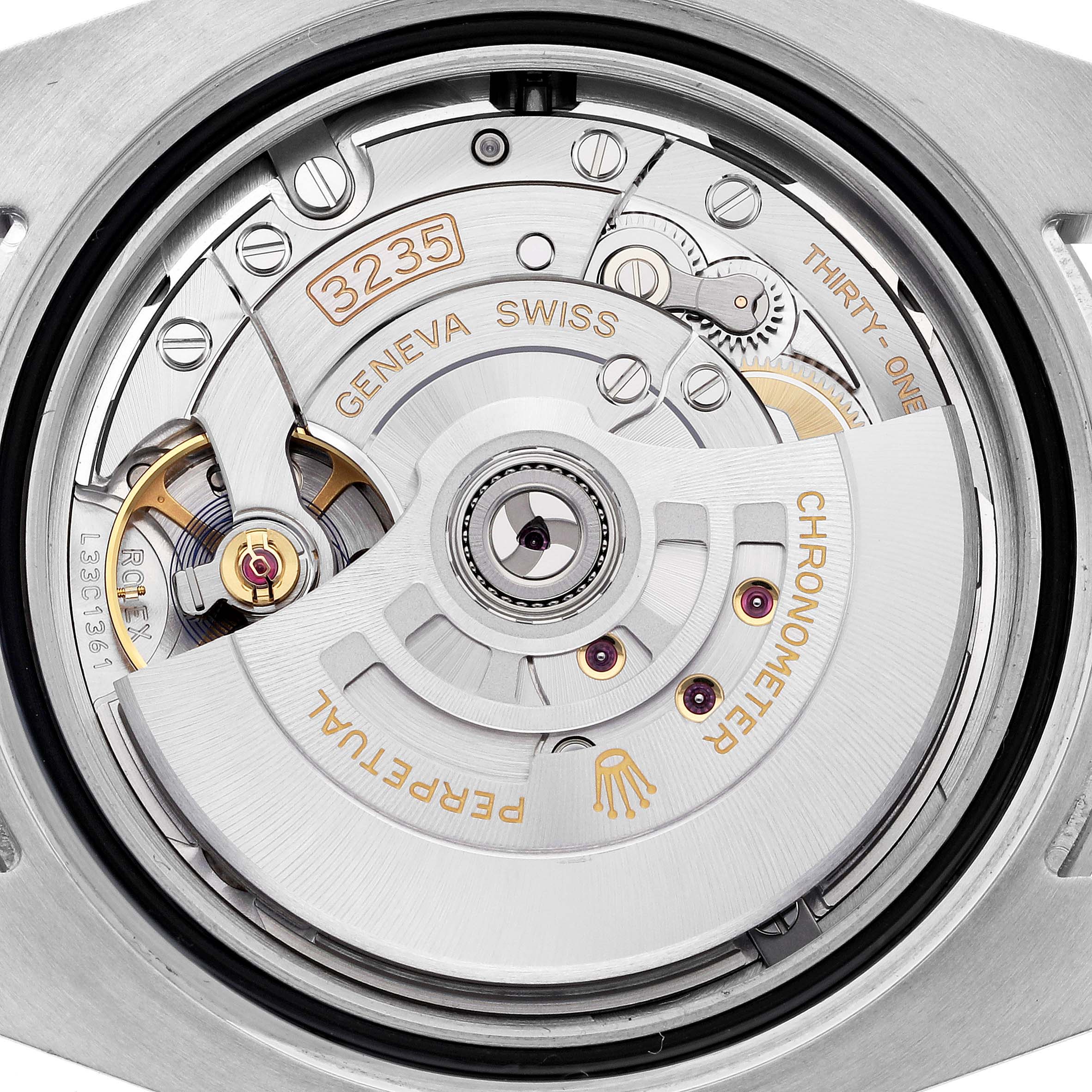 The image shows the movement of a Rolex Submariner 126610LV Men's Stainless Steel Black Dial 126610LV Men's Stainless Steel Black Dial watch from a top-down angle, highlighting its intricate mechanical components.