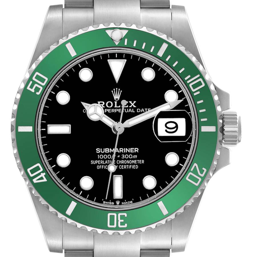 The image shows a front view of a Rolex Submariner with a green bezel, black dial, and date window.