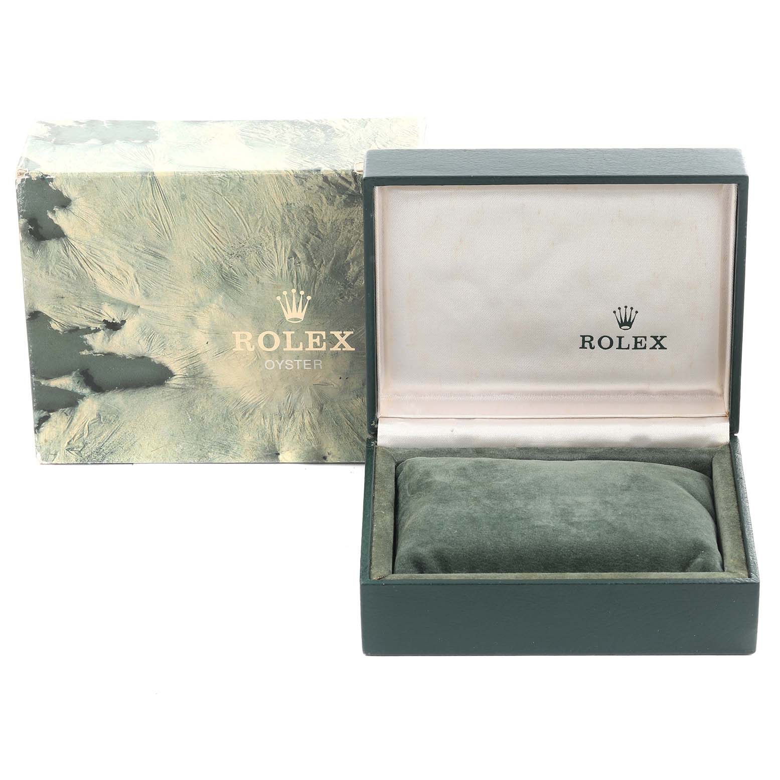 The image shows a Rolex Submariner 16613 Men's Steel and Gold (two tone) Black Dial 16613 Men's Steel and Gold (two tone) Black Dial watch box at an angle, displaying its exterior packaging and interior cushion.