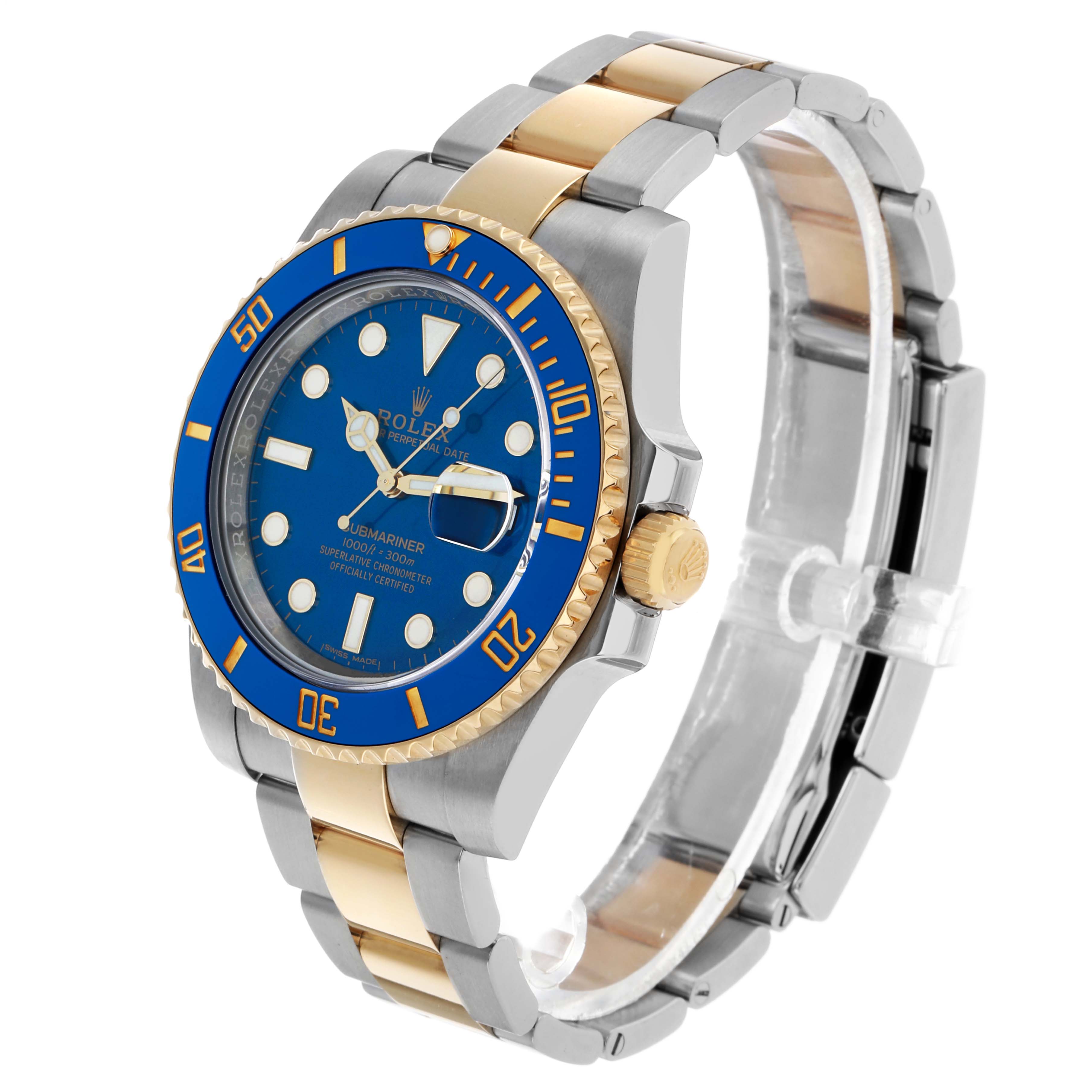 The Rolex Submariner 116613 Men's Steel and Gold (two tone) Blue Dial watch is shown from a three-quarter angle highlighting the blue bezel, dial, gold crown, and two-tone bracelet.