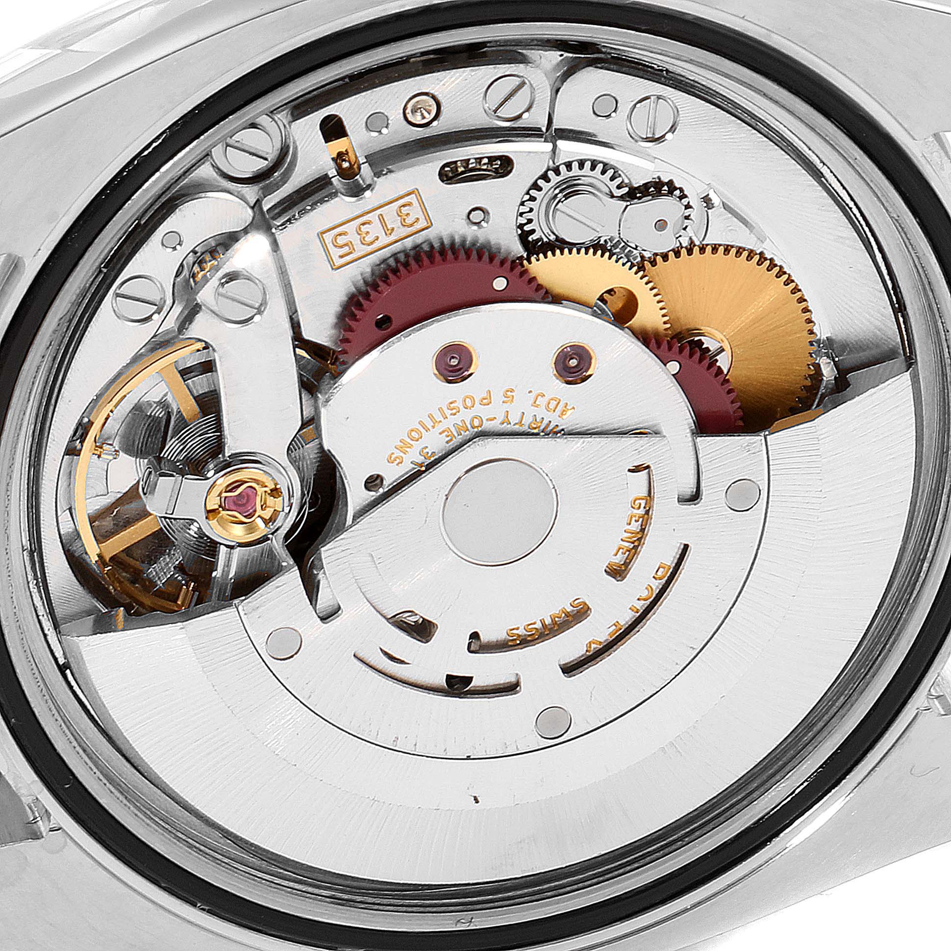 This is a close-up view of the Rolex Turn-o-Graph 116264 Men's Stainless Steel White Dial 116264 Men's Stainless Steel White Dial watch's internal mechanism, showcasing gears and movement components.