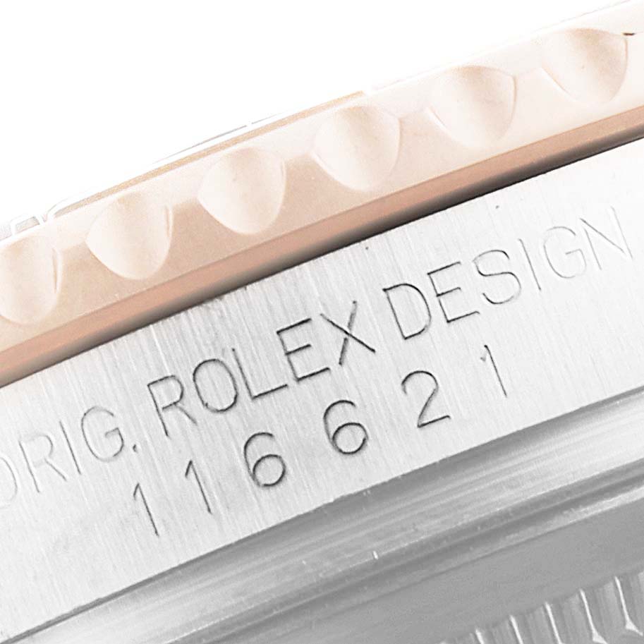 The image shows a close-up of the bezel and side of a Rolex Yacht-Master 116621 Men
s Steel and Gold (two tone) Black Dial 116621 Men
s Steel and Gold (two tone) Black Dial watch, highlighting its model number 
116621
.