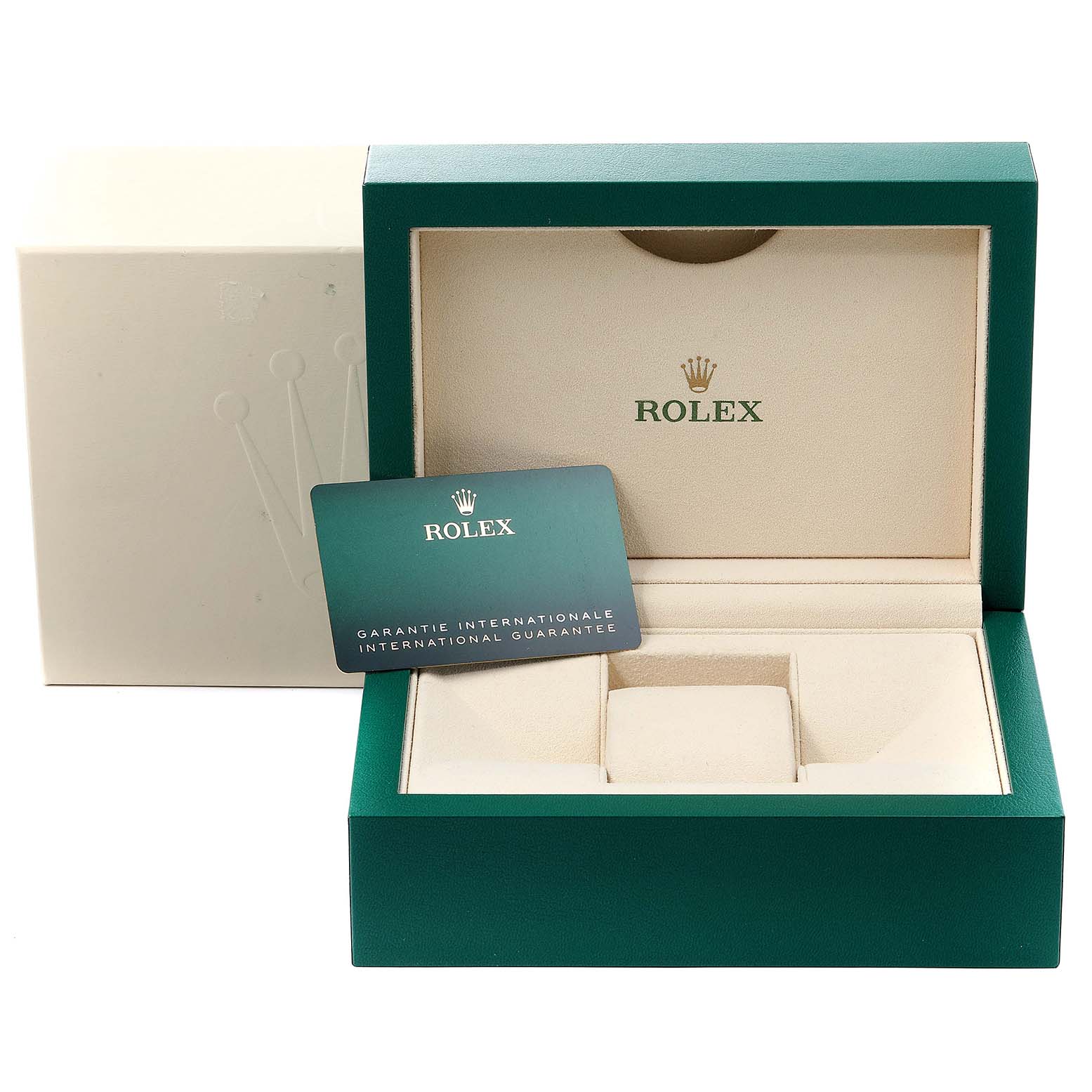 This image shows the open box of a Rolex Yacht-Master 126622 Men's Stainless Steel Blue Dial 126622 Men's Stainless Steel Blue Dial containing the international guarantee card and watch cushion.