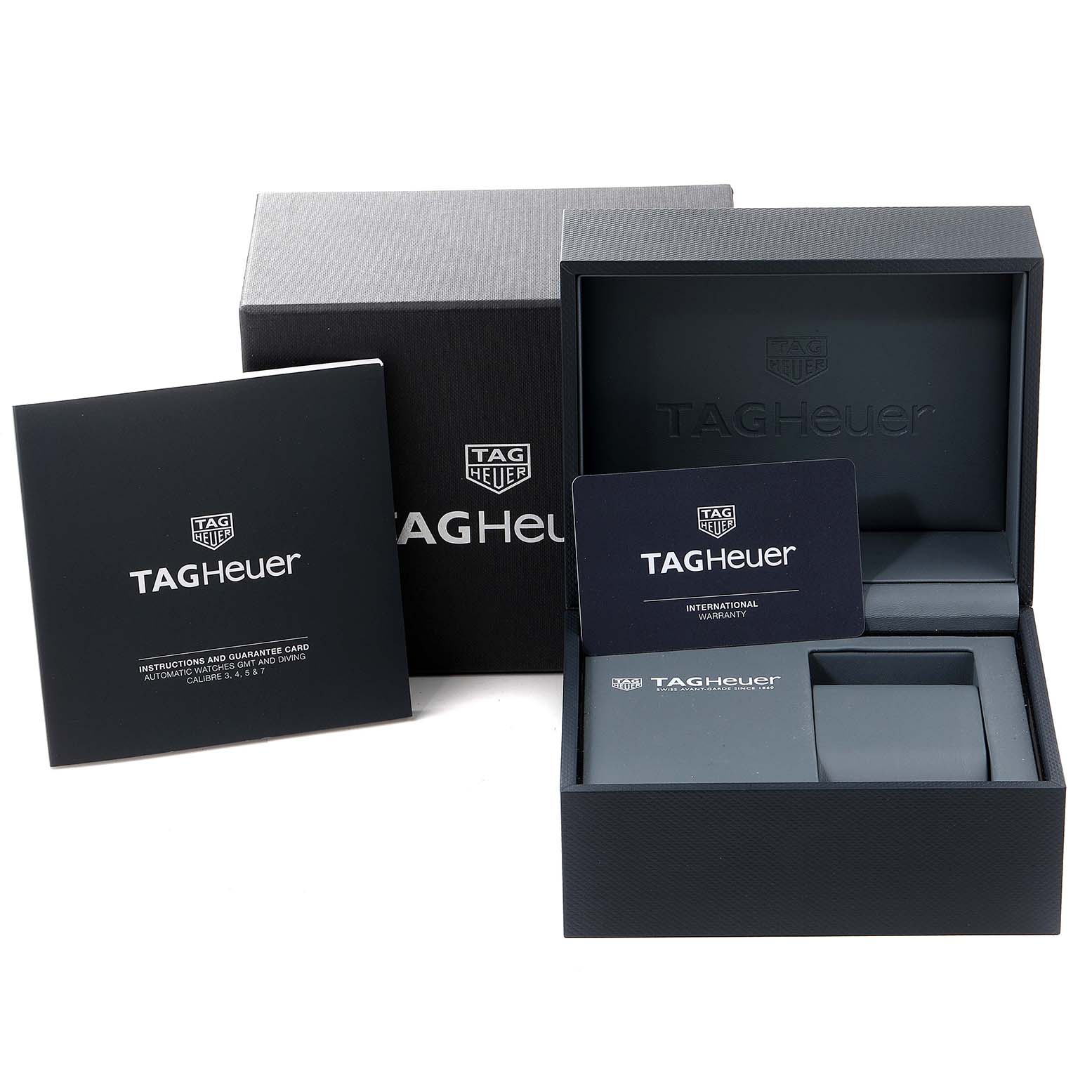 This image shows the box, instruction manual, warranty card, and watch cushion for the Tag Heuer Aquaracer WAY201B Men's Stainless Steel Blue Dial WAY201B Men's Stainless Steel Blue Dial model.