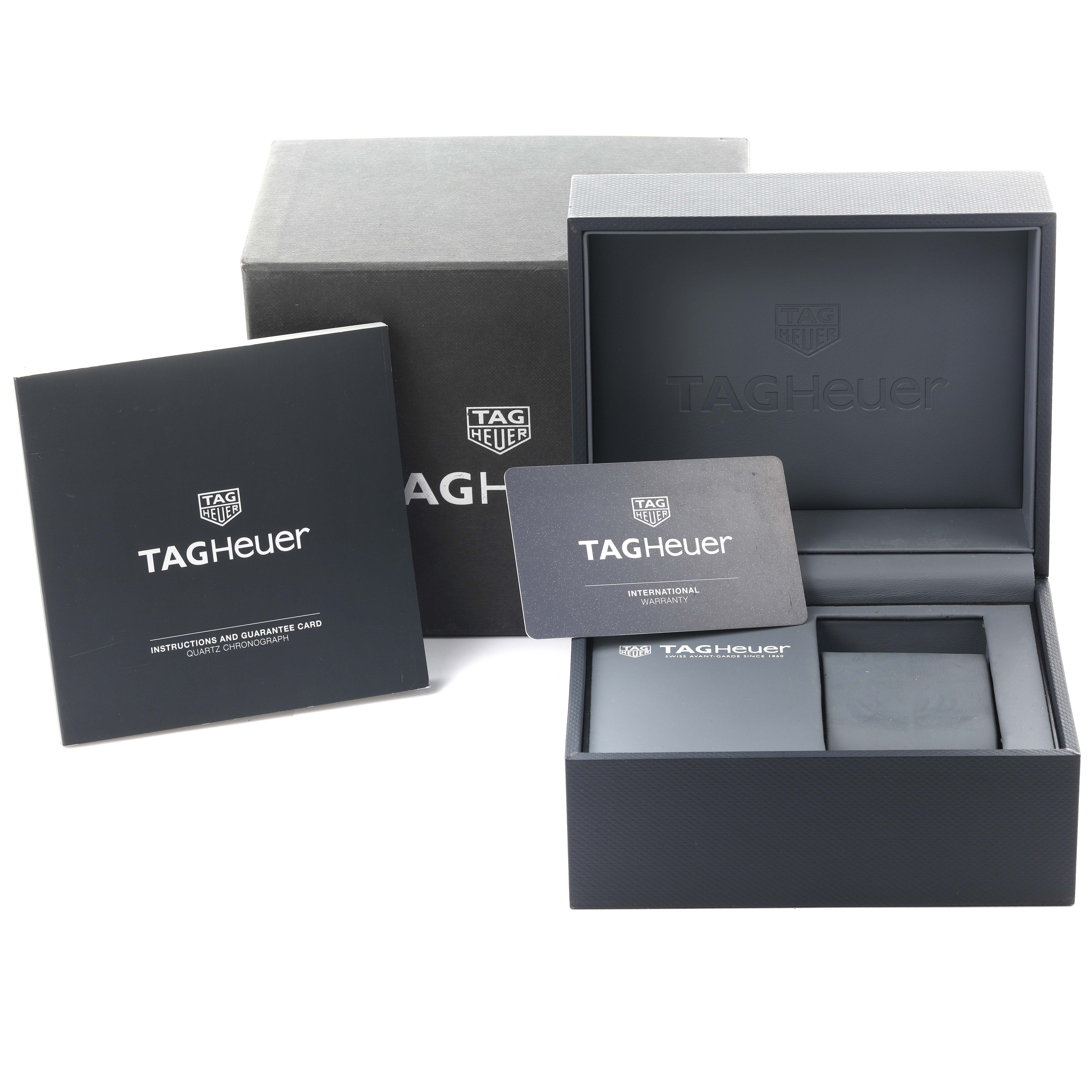 The image shows the packaging and accessories of a Tag Heuer Aquaracer WAY2015.BA0927 Men's Stainless Steel Green Dial WAY2015.BA0927 Men's Stainless Steel Green Dial, including the box, warranty card, and instruction booklet.