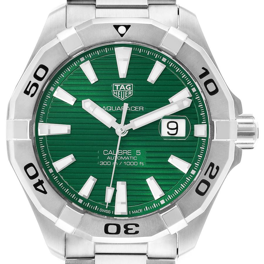 The Tag Heuer Aquaracer watch is shown from the front, highlighting its green dial, numbered bezel, and date feature.