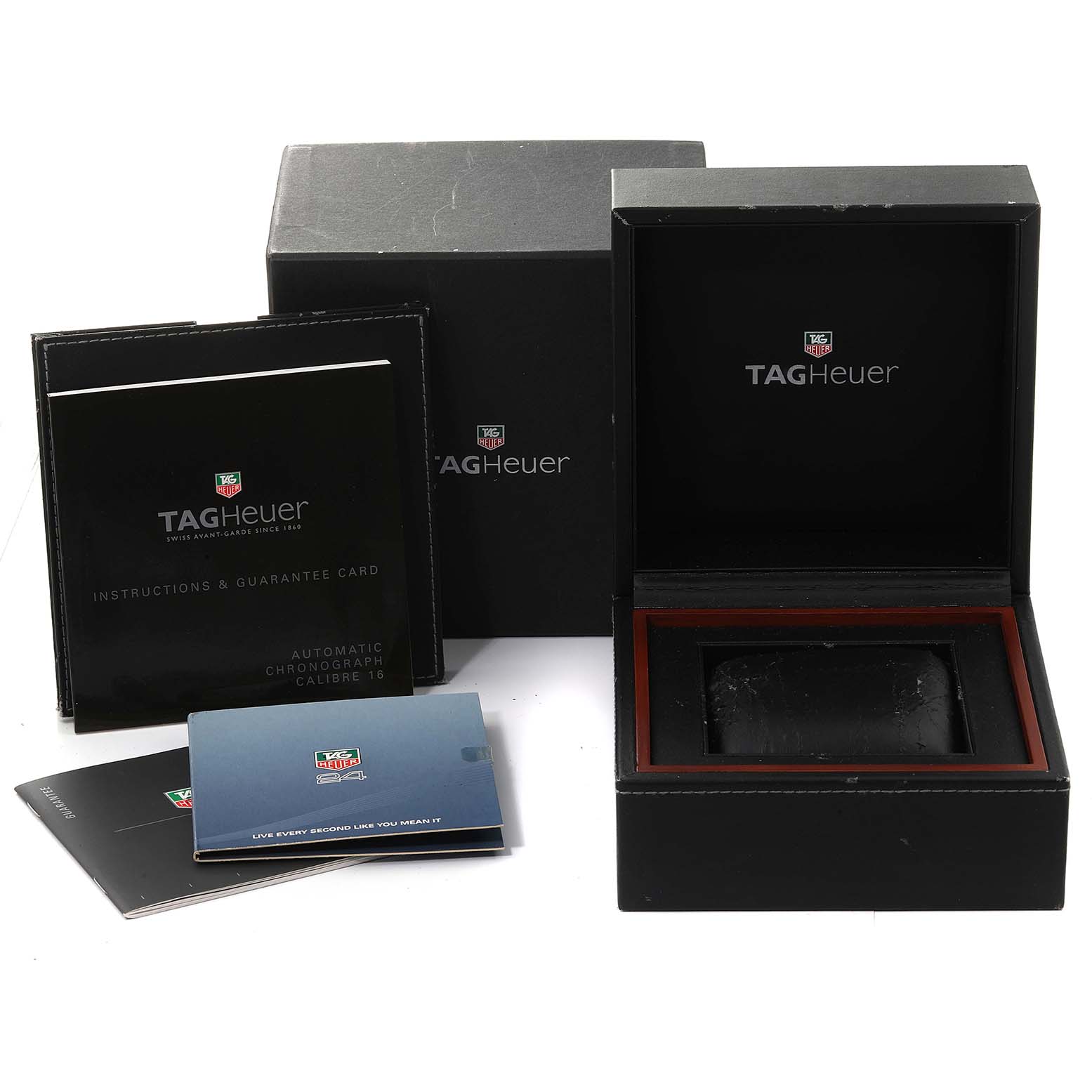 The image shows the packaging, instruction manual, and guarantee card for a Tag Heuer Carrera CV2014 Men's Stainless Steel Black Dial CV2014 Men's Stainless Steel Black Dial watch.