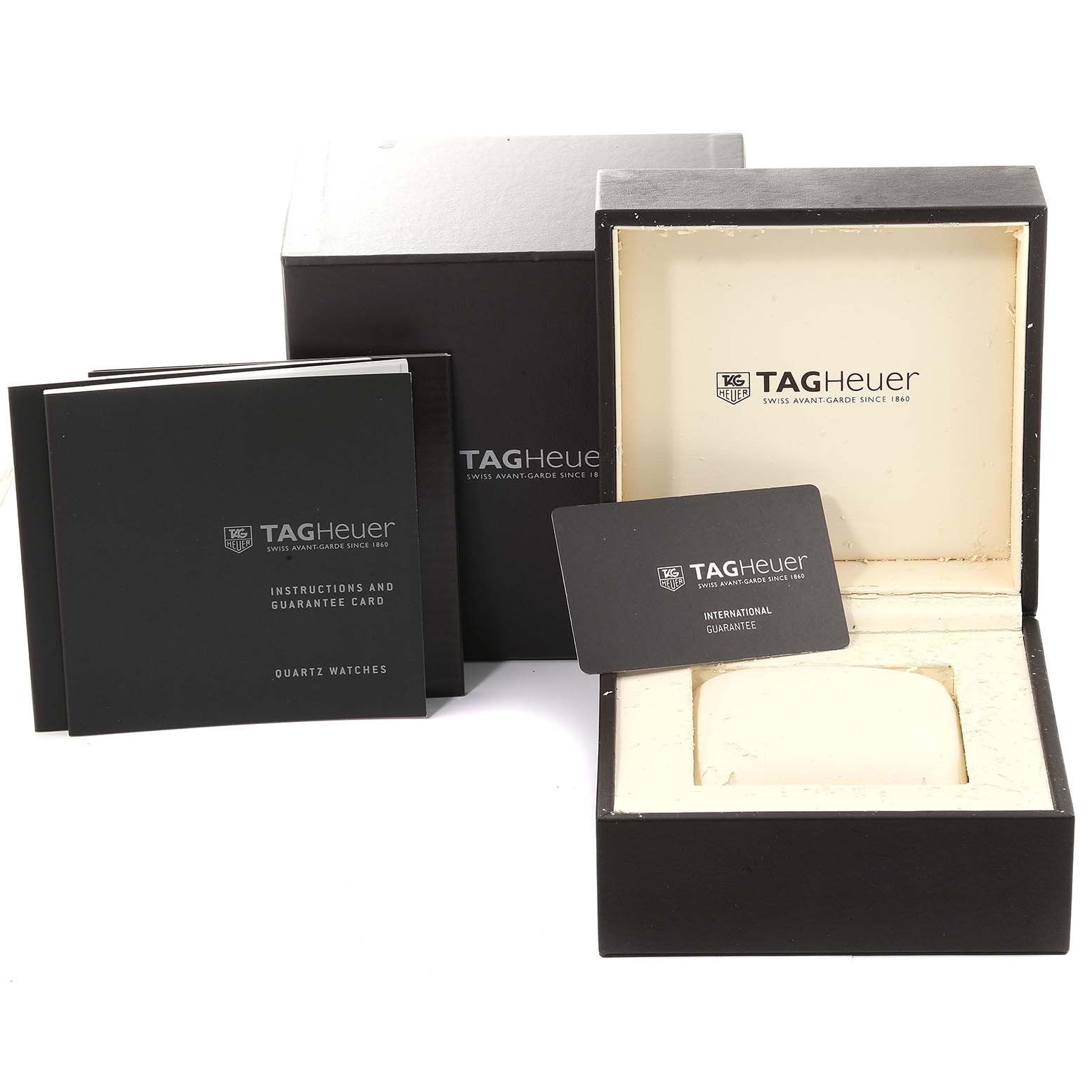 The image shows the packaging and accessories for a Tag Heuer Carrera WV1412 Women's Stainless Steel Black Dial WV1412 Women's Stainless Steel Black Dial watch, including the inner and outer boxes and documentation.