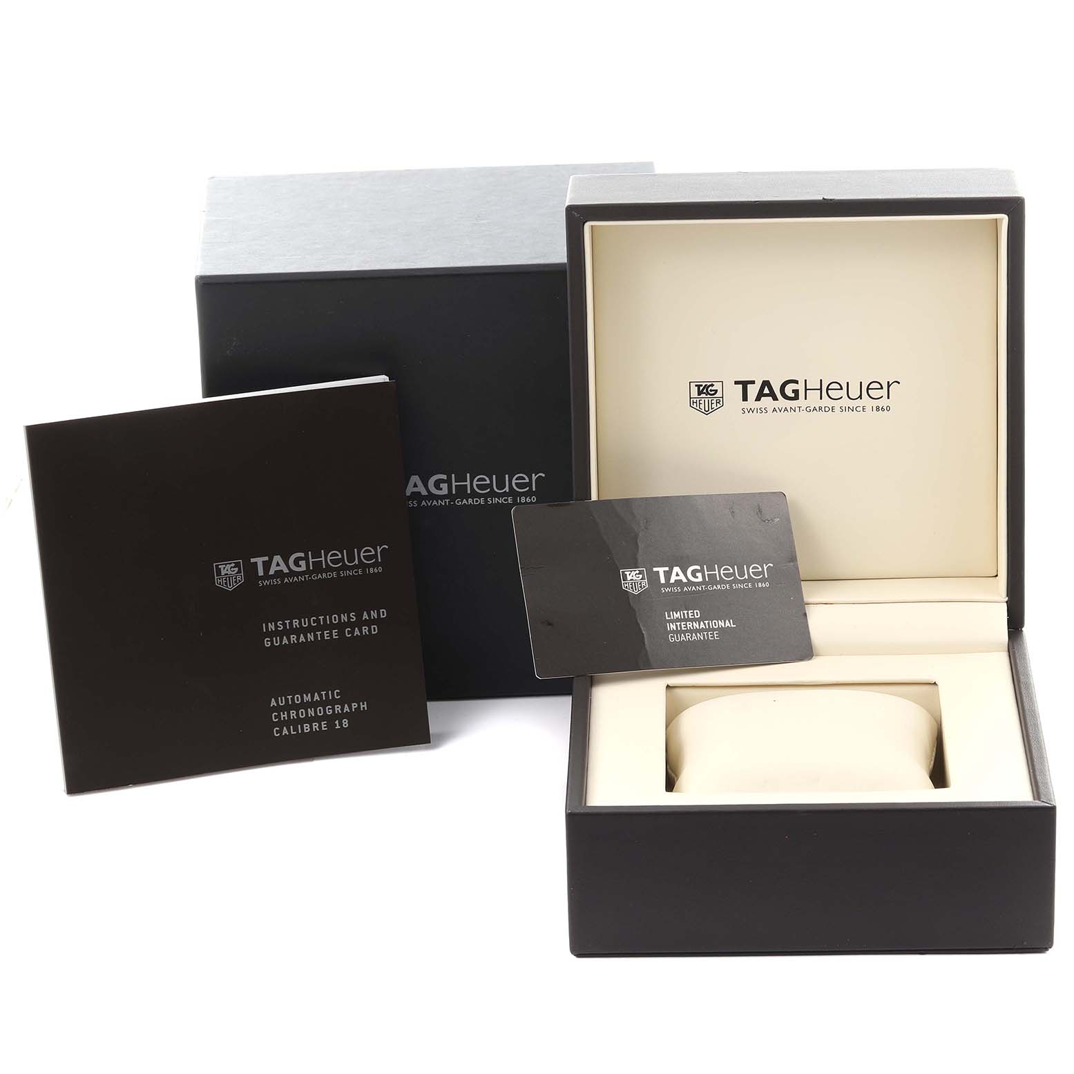 The image shows a Tag Heuer Carrera CAR221A.FC6353 Men's Stainless Steel White Dial CAR221A.FC6353 Men's Stainless Steel White Dial watch box, guarantee card, and instruction manual.