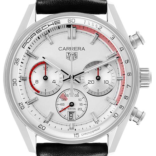 The Tag Heuer Carrera watch is shown from a front angle, displaying its dial, subdials, bezel, and crown.