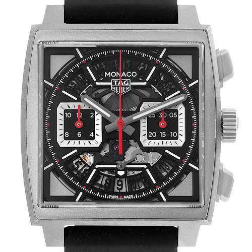 The image shows a frontal view of the Tag Heuer Monaco watch, highlighting its dial and subdials with visible mechanical elements.