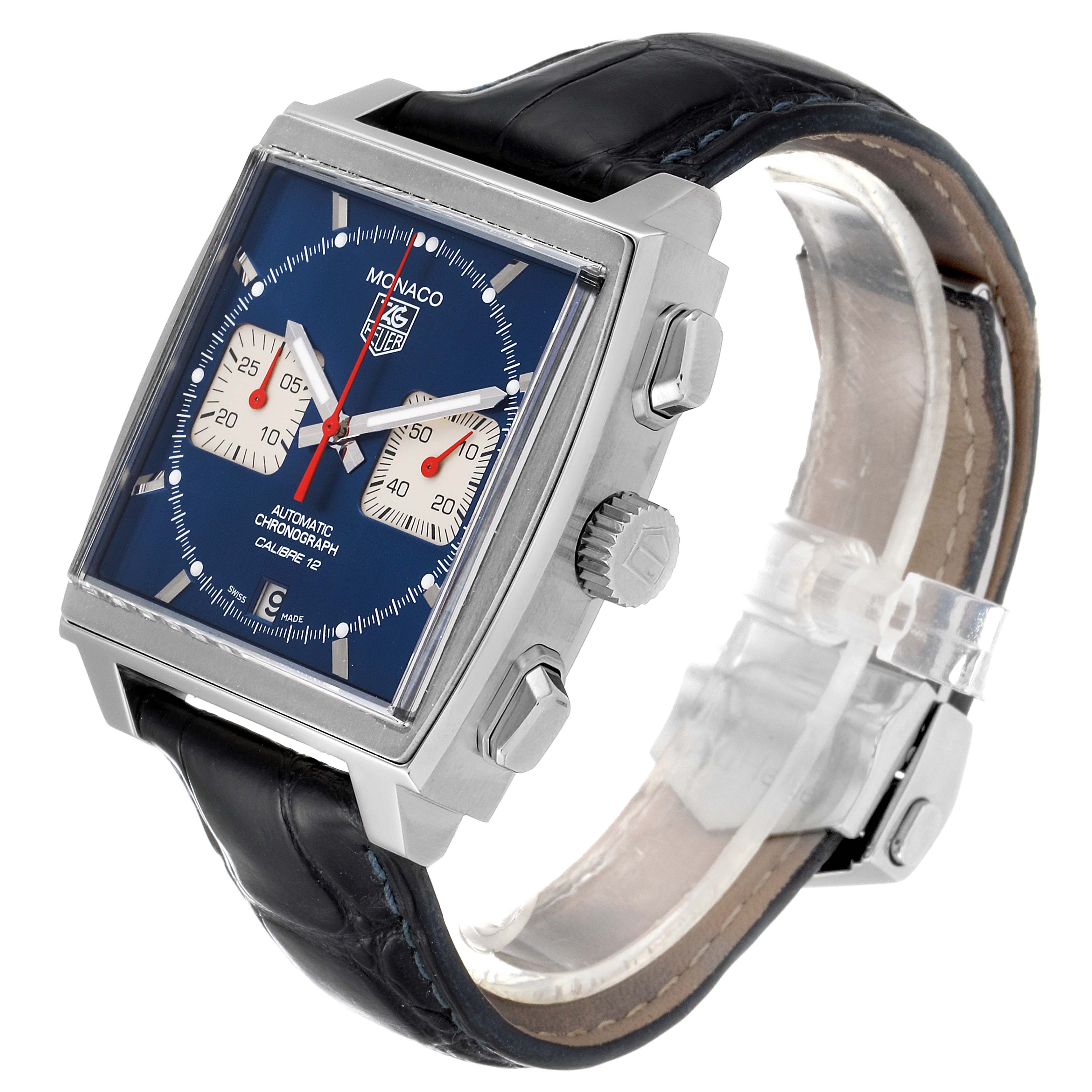 The image shows a Tag Heuer Monaco CAW2111 Men's Stainless Steel Blue Dial CAW2111 Men's Stainless Steel Blue Dial model watch angled to display the face, crown, chronograph buttons, and leather strap.