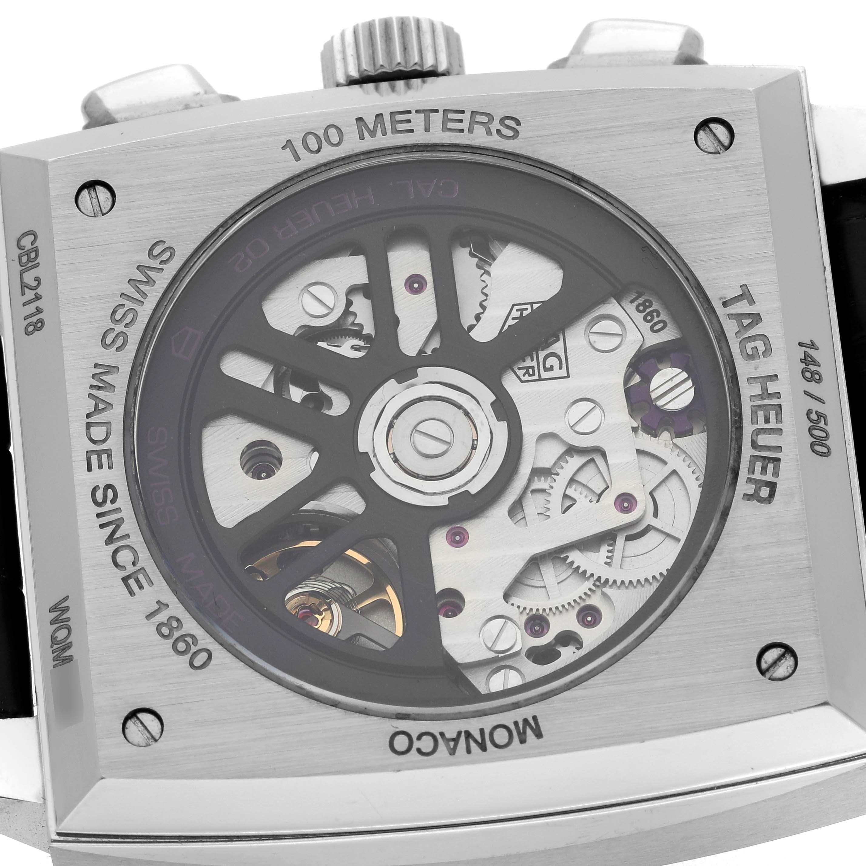 The image shows the back view of a Tag Heuer Monaco CBL2118.FC6518 Men's Stainless Steel Purple Dial CBL2118.FC6518 Men's Stainless Steel Purple Dial watch, highlighting the movement and rotor design.
