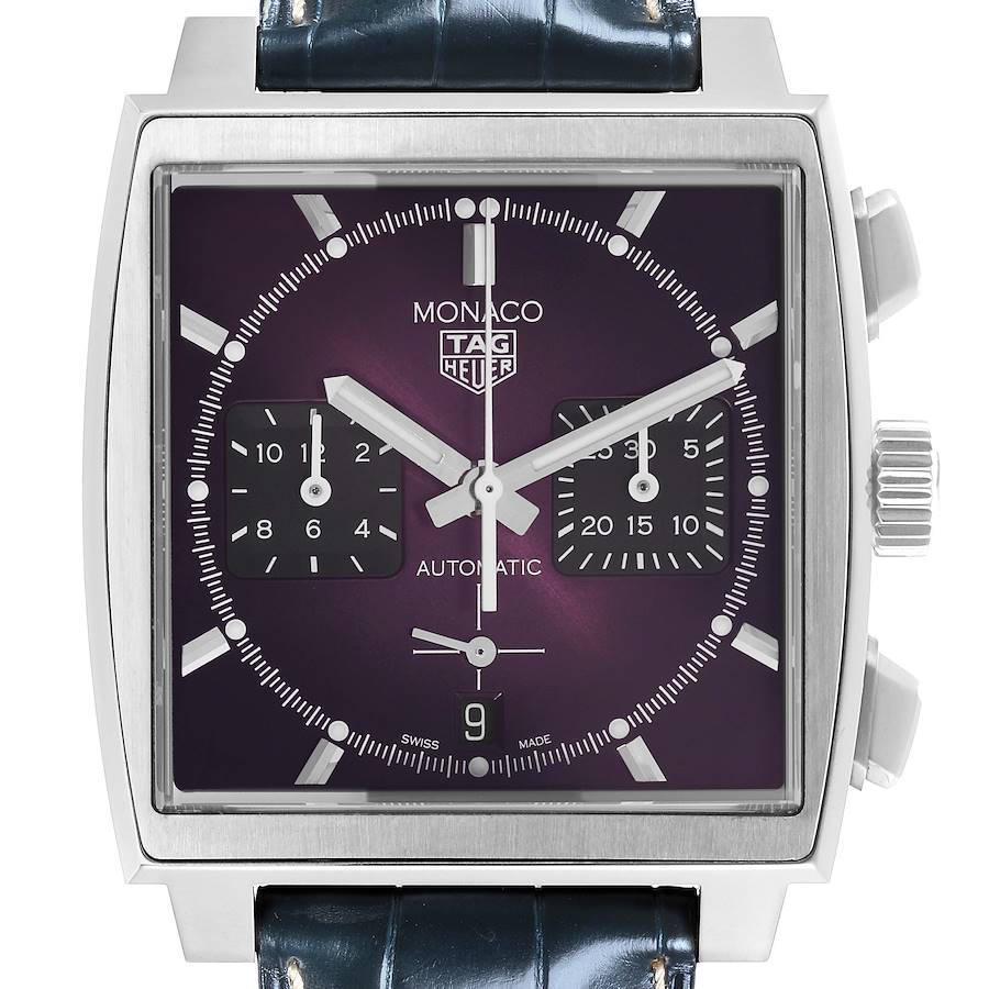 The Tag Heuer Monaco watch is shown from the front, displaying the dial, subdials, hands, and crown.