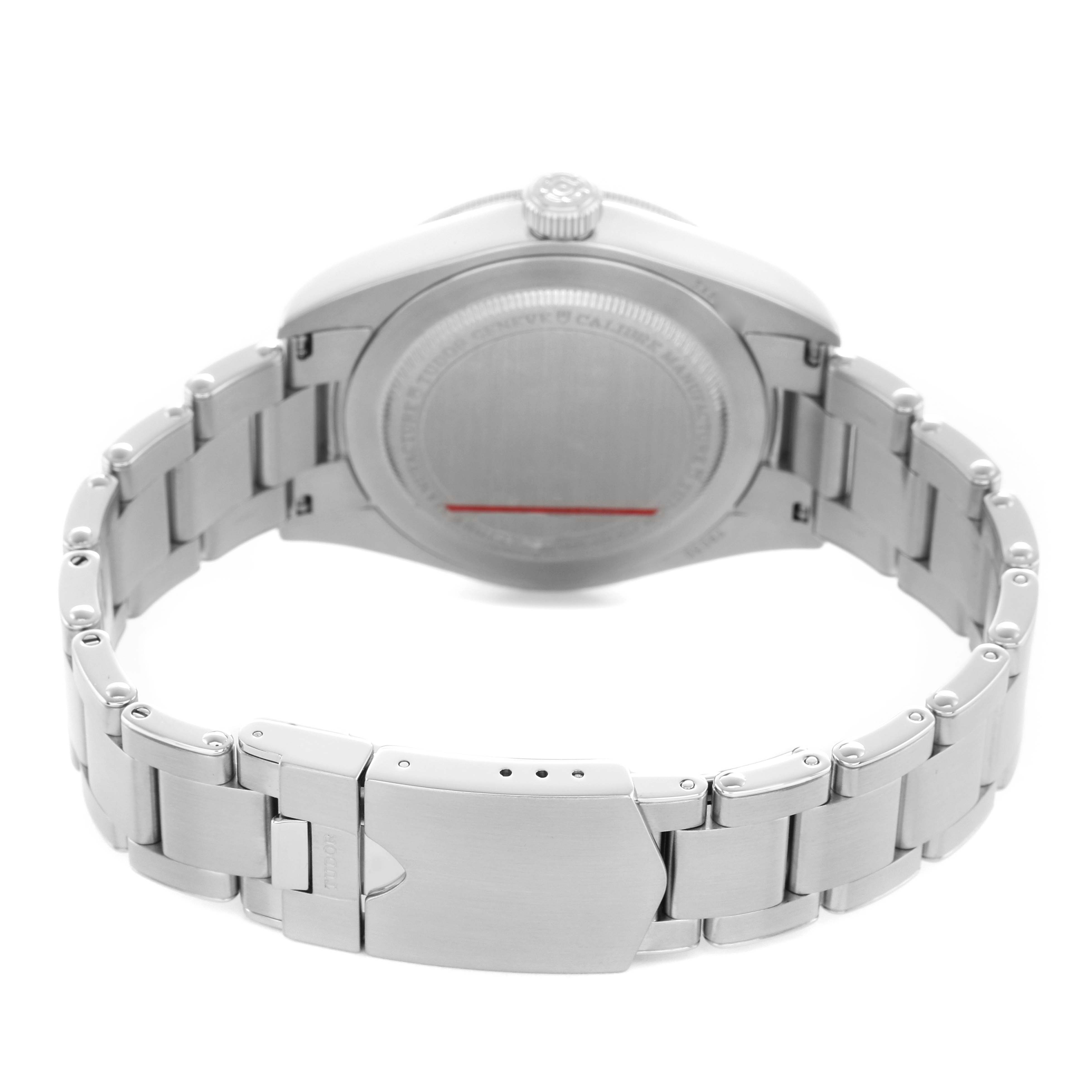 The image shows the back and clasp of the Tudor Heritage Black Bay 79030B Men's Stainless Steel Blue Dial watch, with focus on the bracelet and case back.