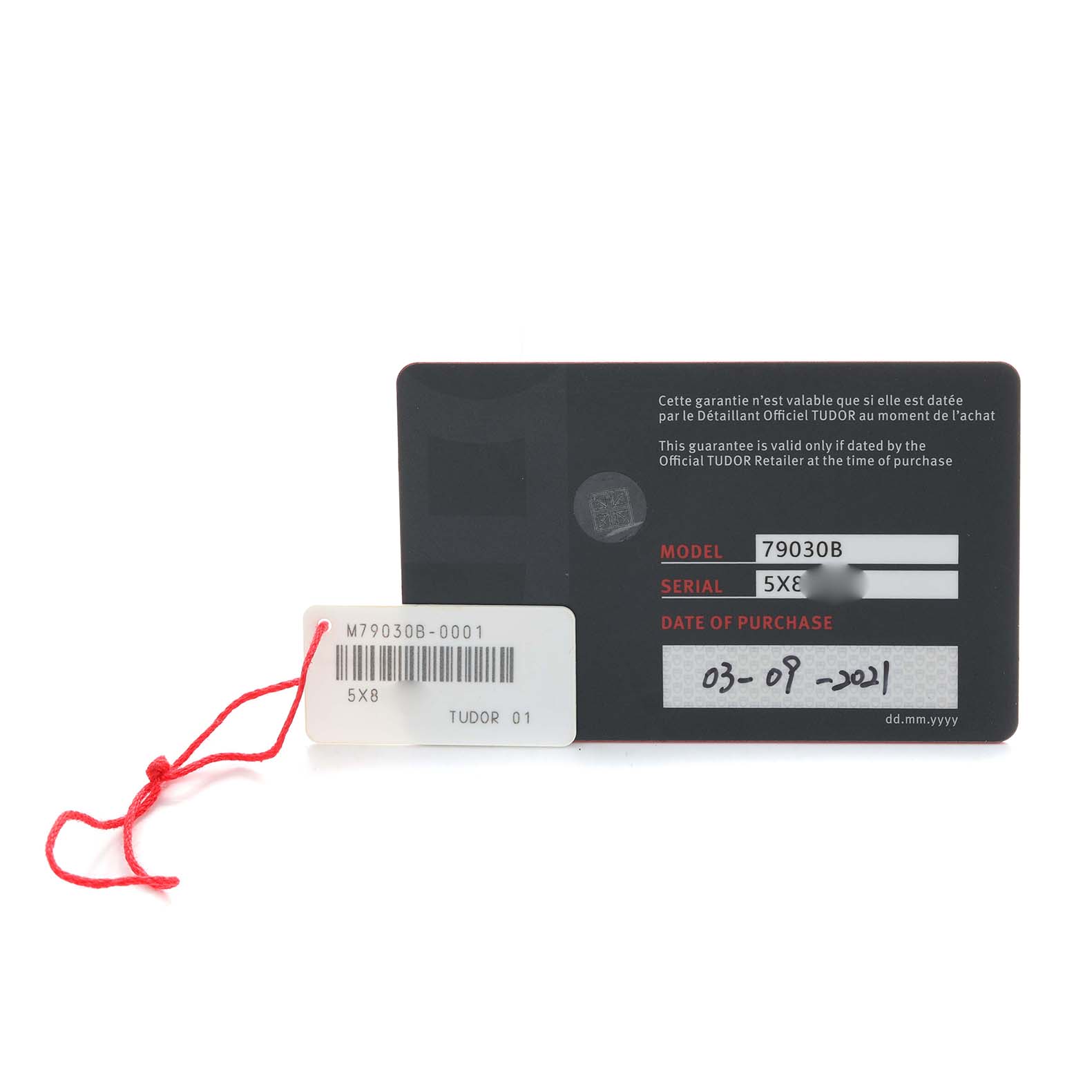 The image shows a warranty card for the Tudor Heritage Black Bay 79030B Men's Stainless Steel Blue Dial model, highlighting model and serial numbers.