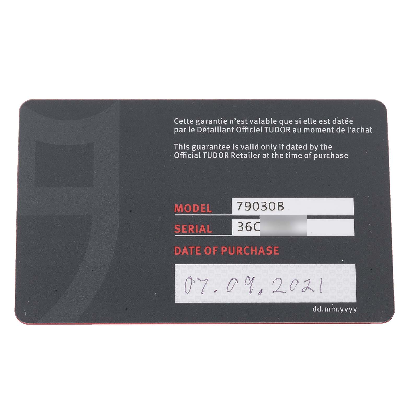 This is a warranty card for the Tudor Heritage Black Bay 79030B Men's Stainless Steel Blue Dial 79030B Men's Stainless Steel Blue Dial watch model 79030B, showing the serial number and date of purchase.