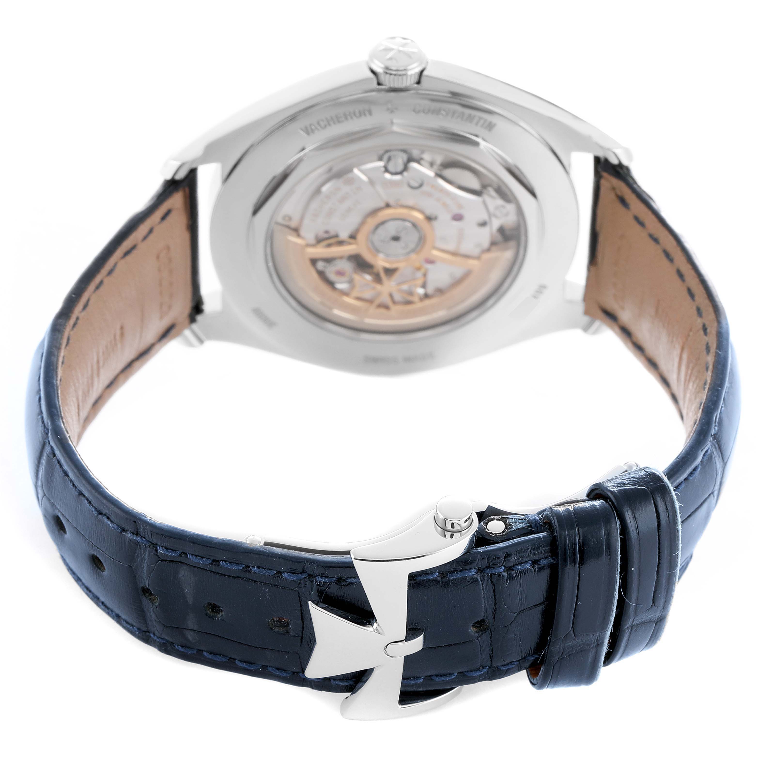 The image shows the back of the Vacheron Constantin Fiftysix 4600E/000A-B487 Men's Stainless Steel Blue Dial watch, highlighting the movement and blue leather strap with the clasp.