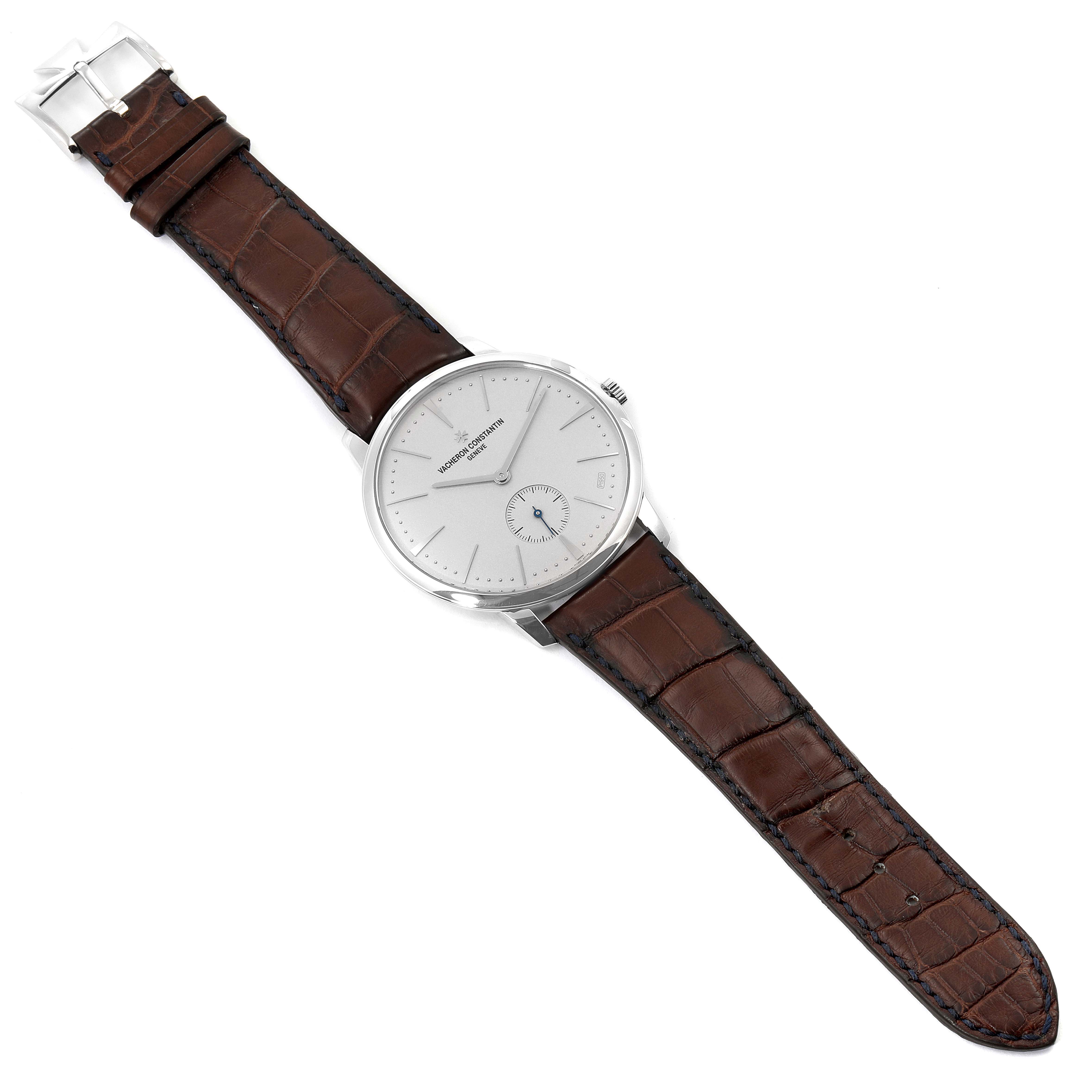The Vacheron Constantin Patrimony 1110U/000P-B306 Men
s Platinum Silver Dial 1110U/000P-B306 Men
s Platinum Silver Dial watch is shown from an overhead angle, displaying the face, bezel, crown, and brown leather strap.