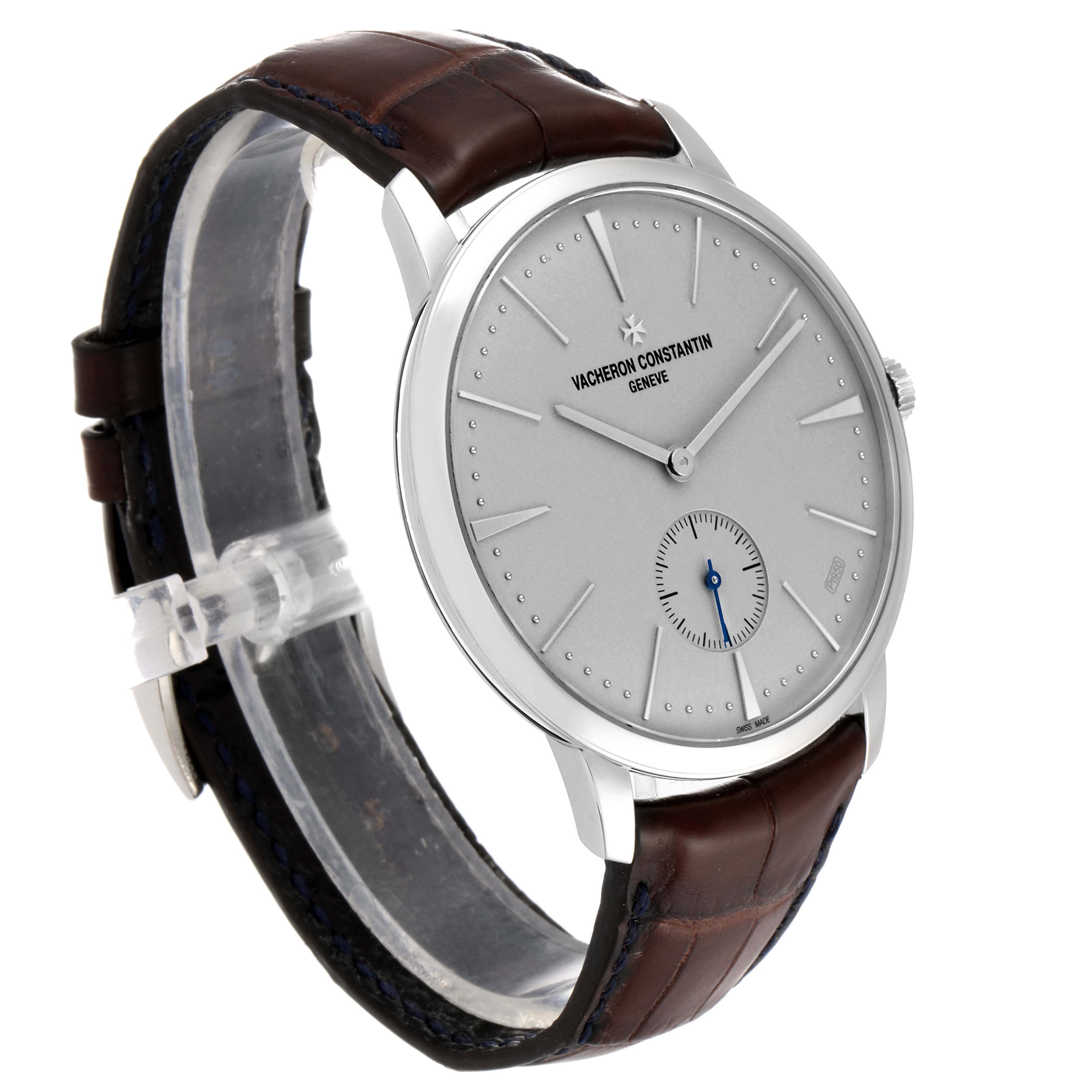 The Vacheron Constantin Patrimony 1110U/000P-B306 Men
s Platinum Silver Dial 1110U/000P-B306 Men
s Platinum Silver Dial watch is shown at an angled side view, highlighting its silver dial, brown leather strap, and minimalist design.